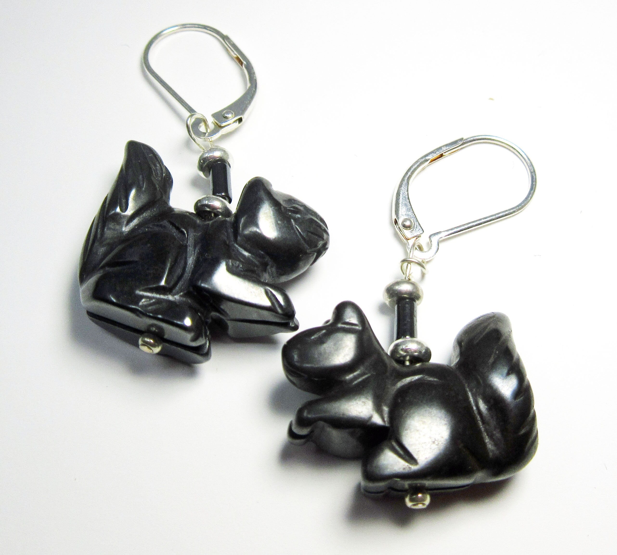 Close-up of Squirrel Earrings showcasing intricate design and earthy colors, perfect for quirky friends and animal enthusiasts.