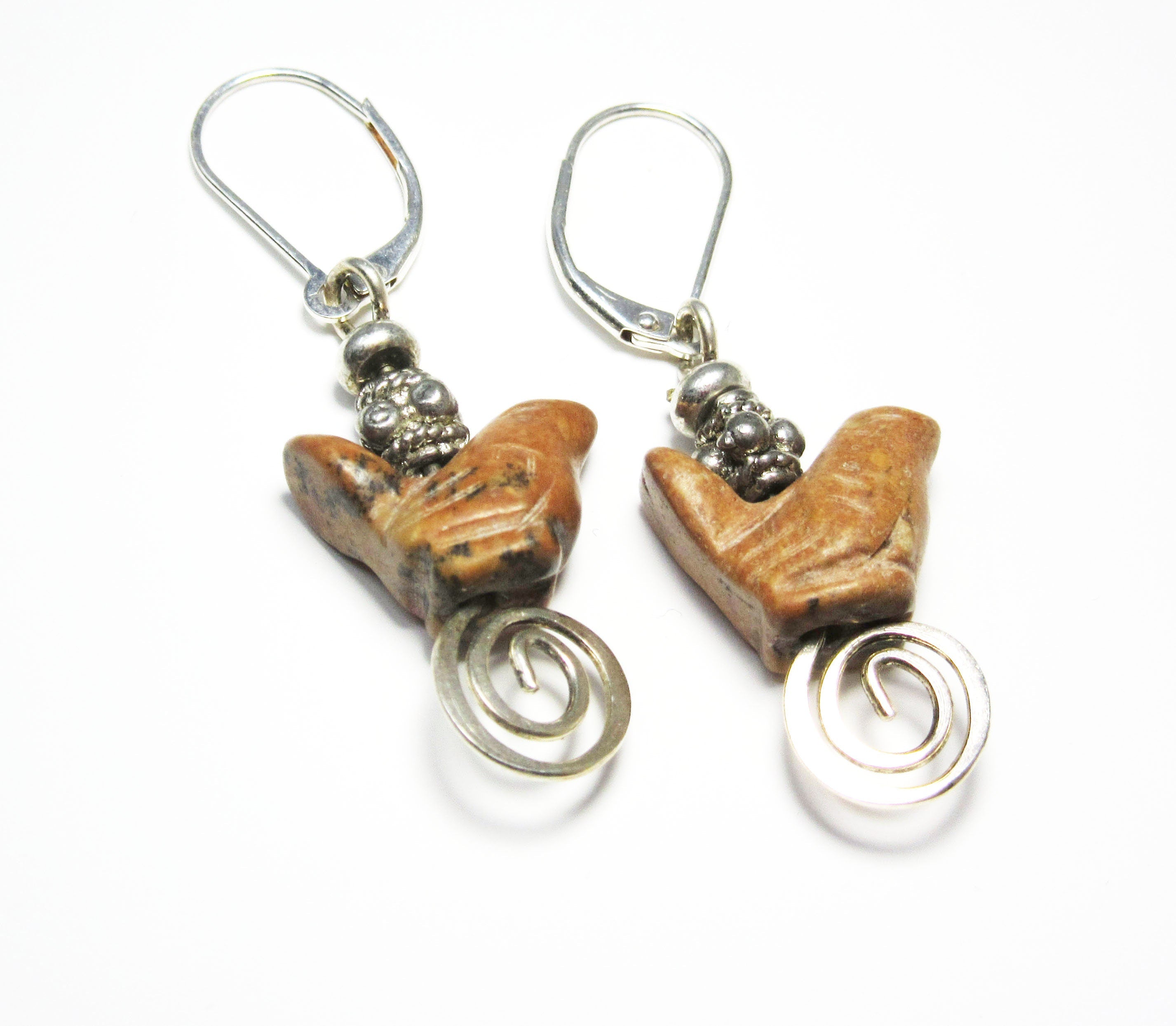 The Carved Jasper Songbird Earrings feature brown bird-shaped beads with silver accents and coiled wire dangles—an ideal handcrafted gift for bird lovers&
