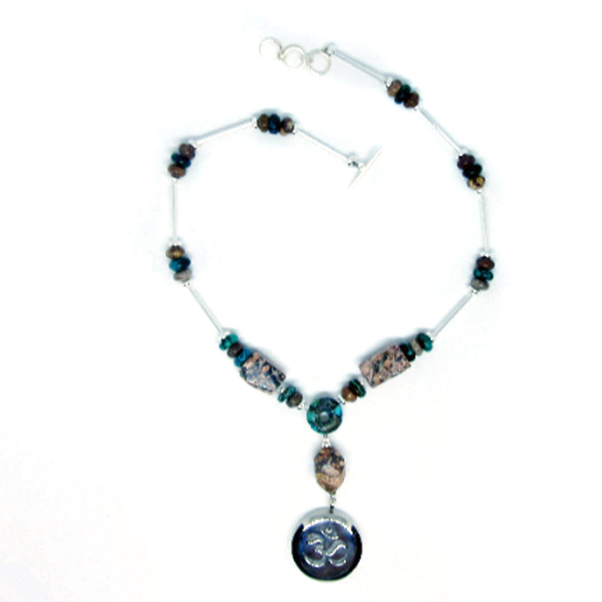 Rare stone essential oil diffuser necklace featuring rhodochrosite and turquoise with a Namaste symbol locket, from Enlivenadorn by Gwynstone.