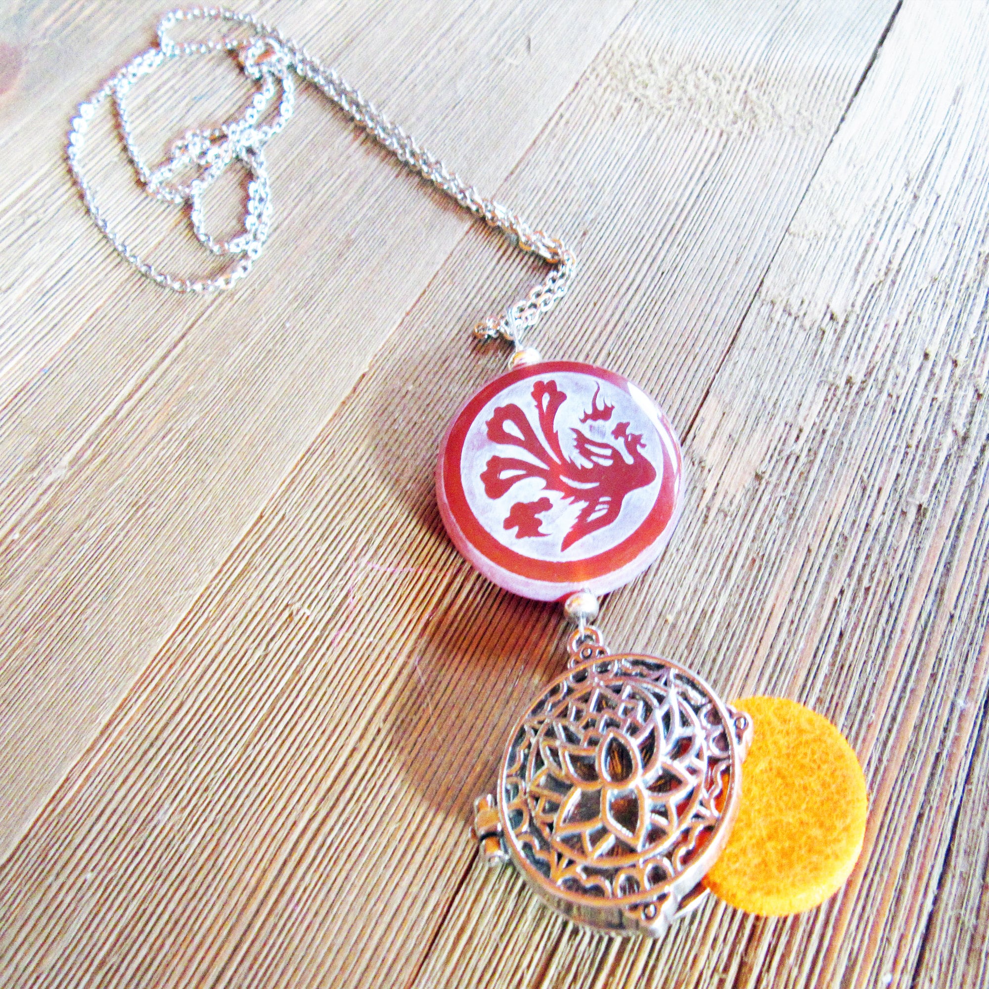 Peacock and Dragon Etched Carnelian Jewelry essential oil locket with colorful changing beads for aromatherapy.