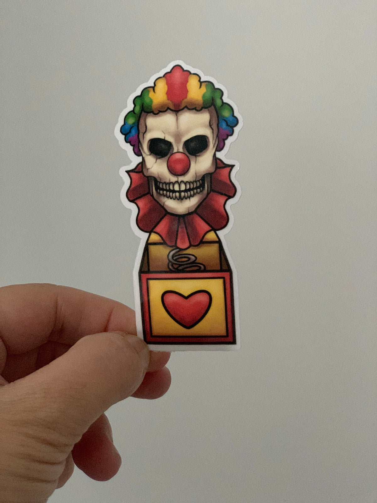 rainbow clown in the box creepy sticker