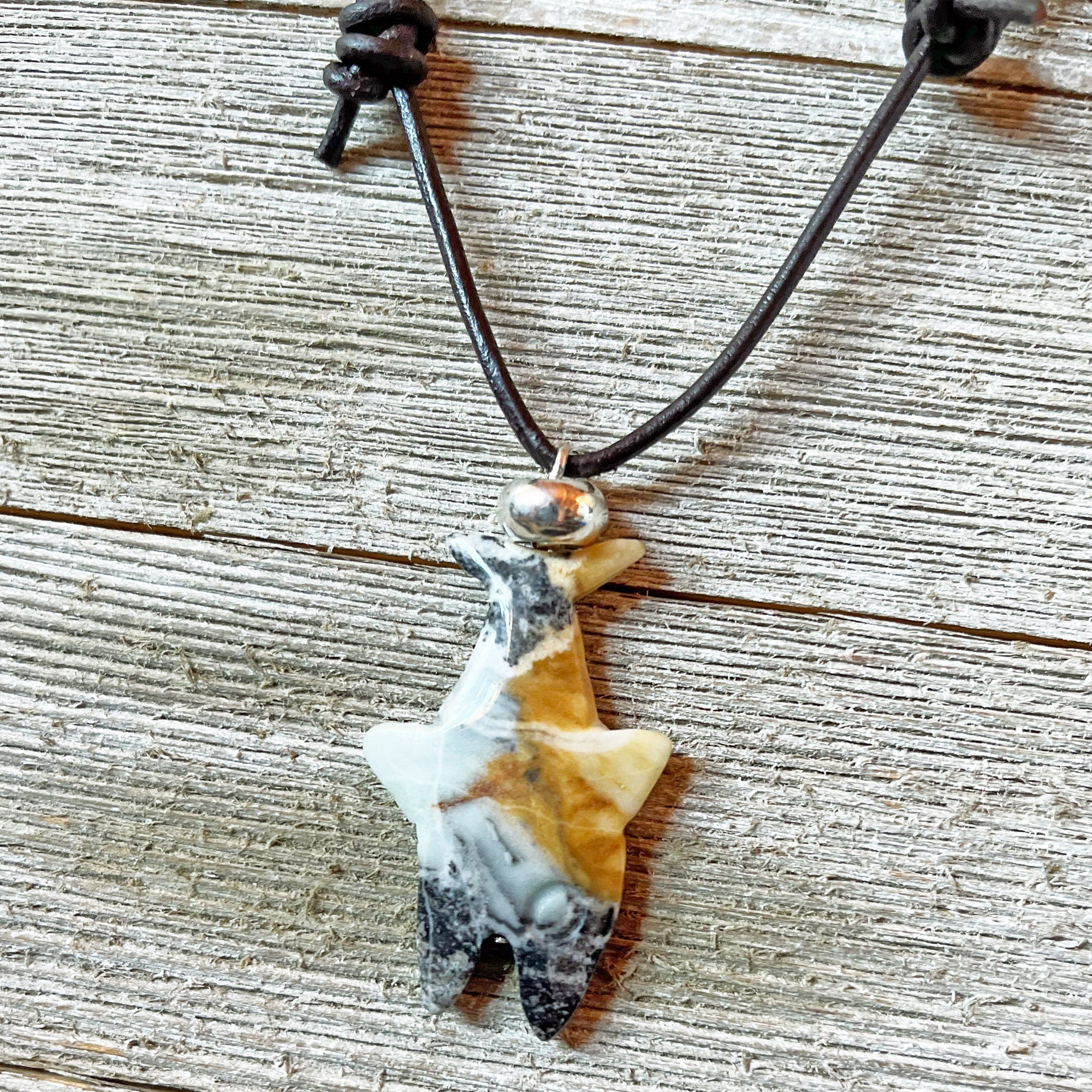 Close-up view of Shark Pendant Carved Amazonite Necklace showcasing unique stone details, ideal for unisex jewelry lovers.