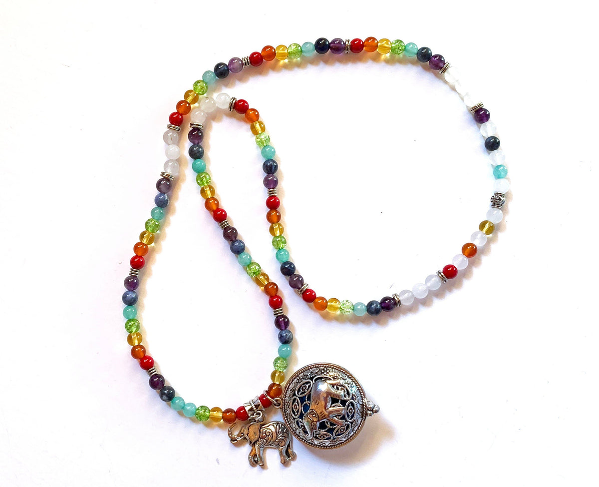 Aromatherapy Jewelry for Zen and Relaxation - Rainbow Quartz Mala Necklace displayed on a soft background, showcasing its vibrant colors.