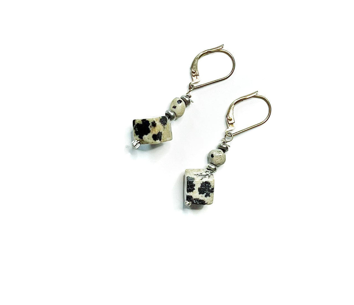 Sacred Geometry Dalmatian Jasper Cube Earrings showcasing the unique spotted Dalmatian Jasper in a cube design with sterling silver artisan craftsmanship.