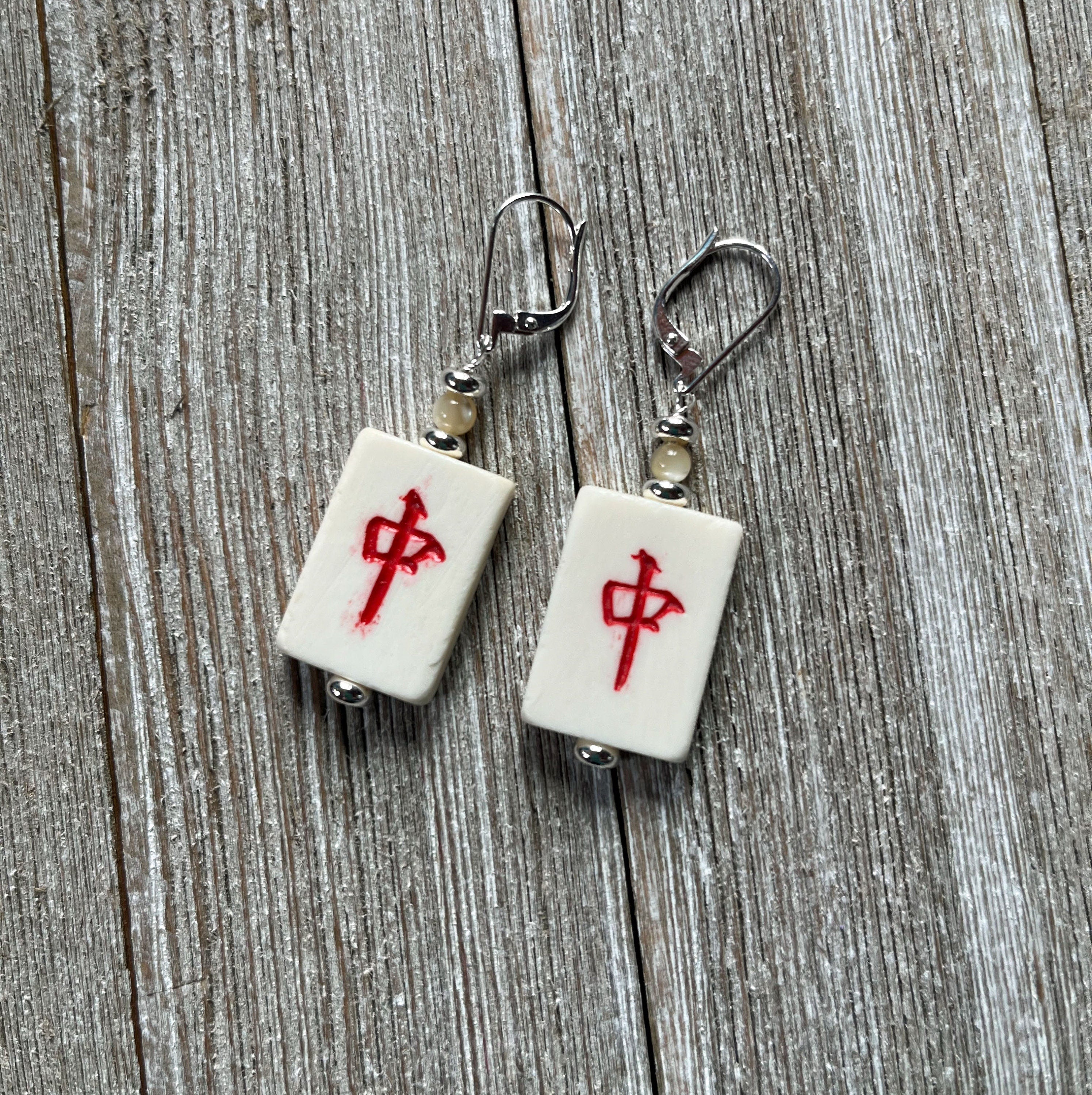 Vintage Mahjong Tile Earrings showcasing wind symbols and intricate designs, stylish accessory for Mahjong lovers.