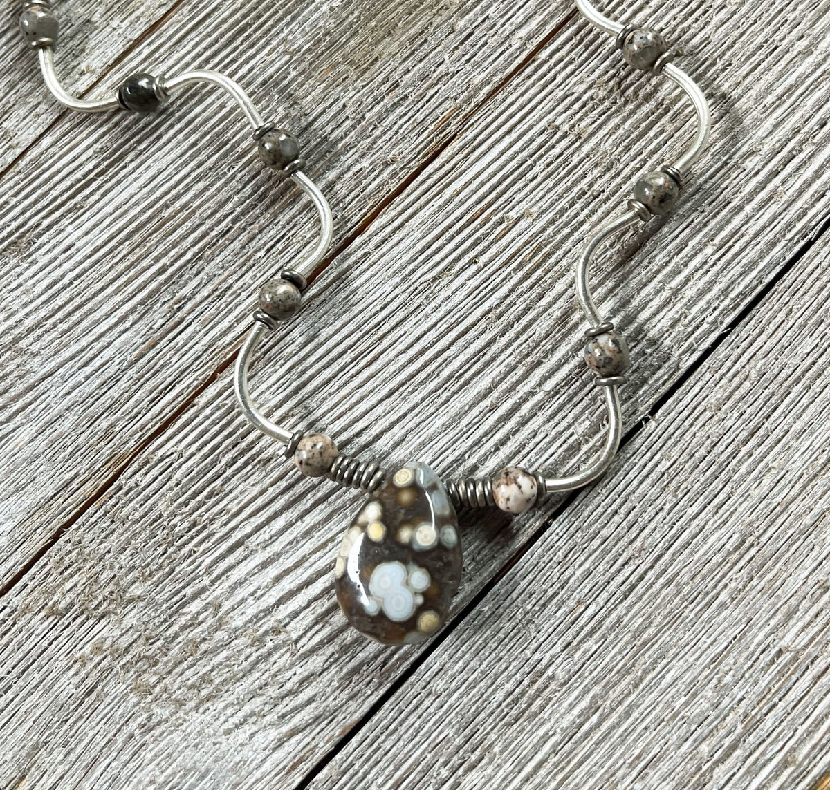 Ocean Jasper Tear Drop and Wavy Sterling Silver Jewelry Set featuring a stunning tear drop pendant and intricate wave patterns, ideal gift for self or nature lovers.