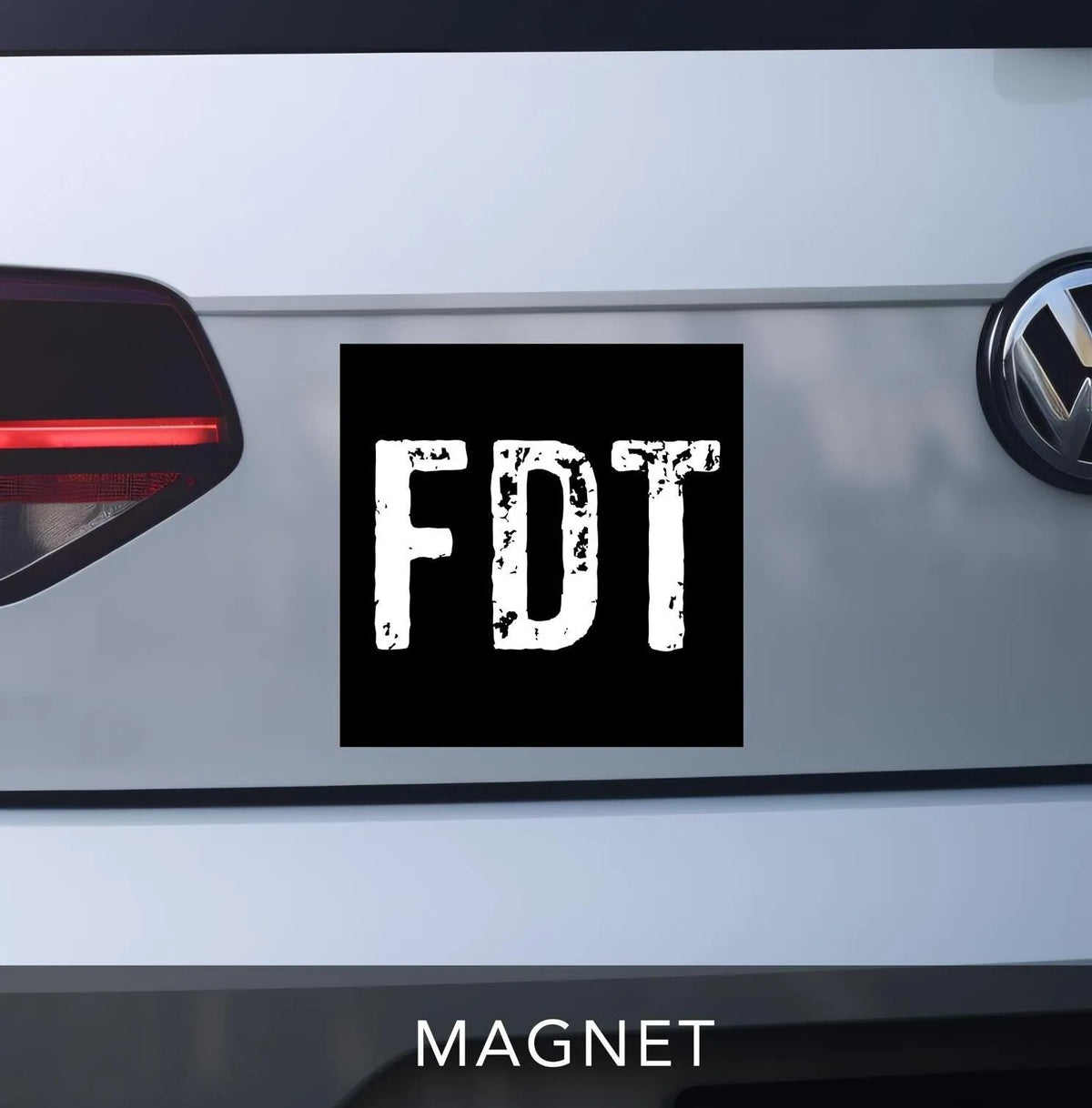 FDT Car Bumper Sticker Magnet. Represents "Fuck Donald Trump". Black square 5x5 magnet with white distressed block lettering.