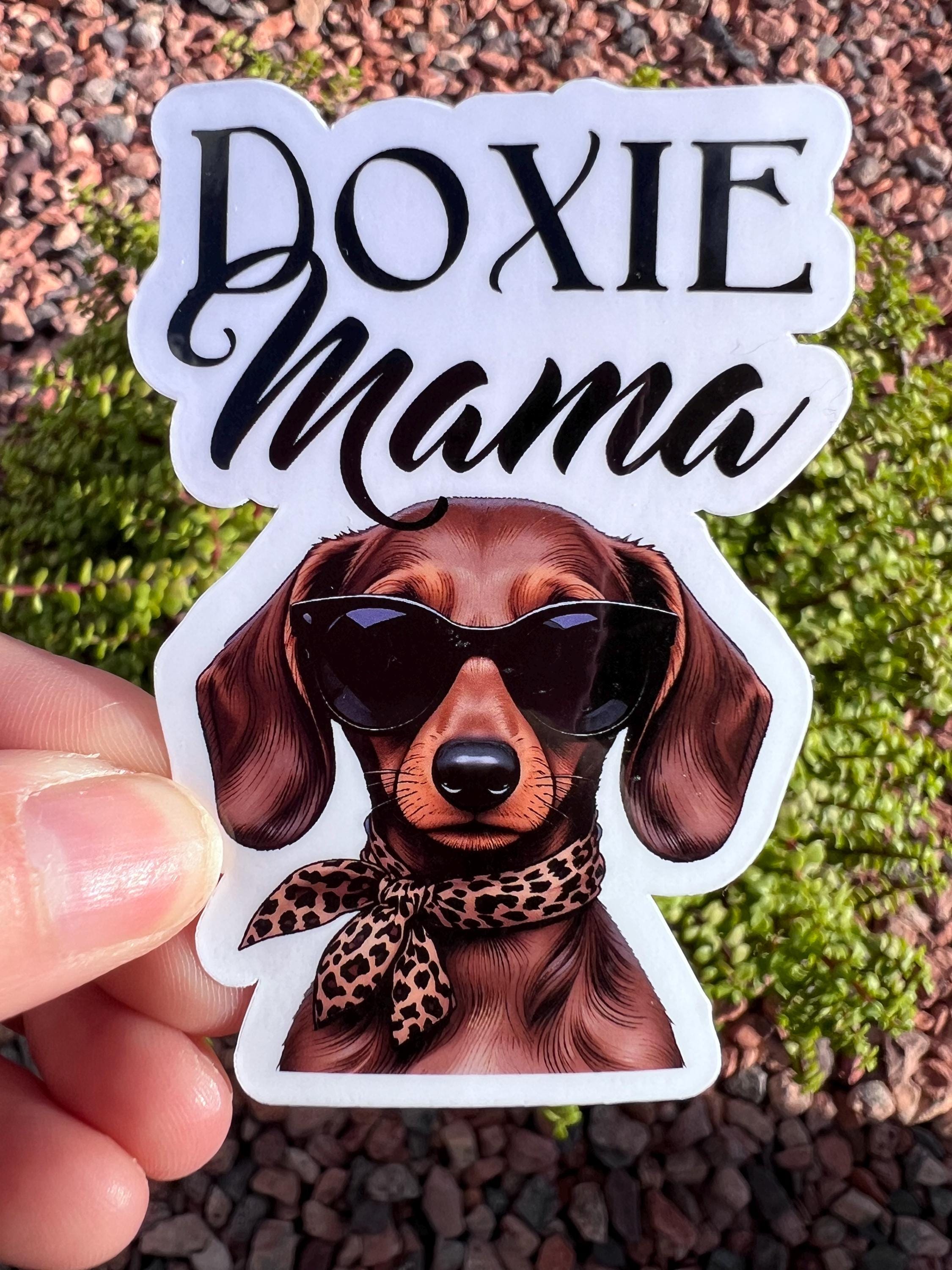 May include: A sticker with the words &