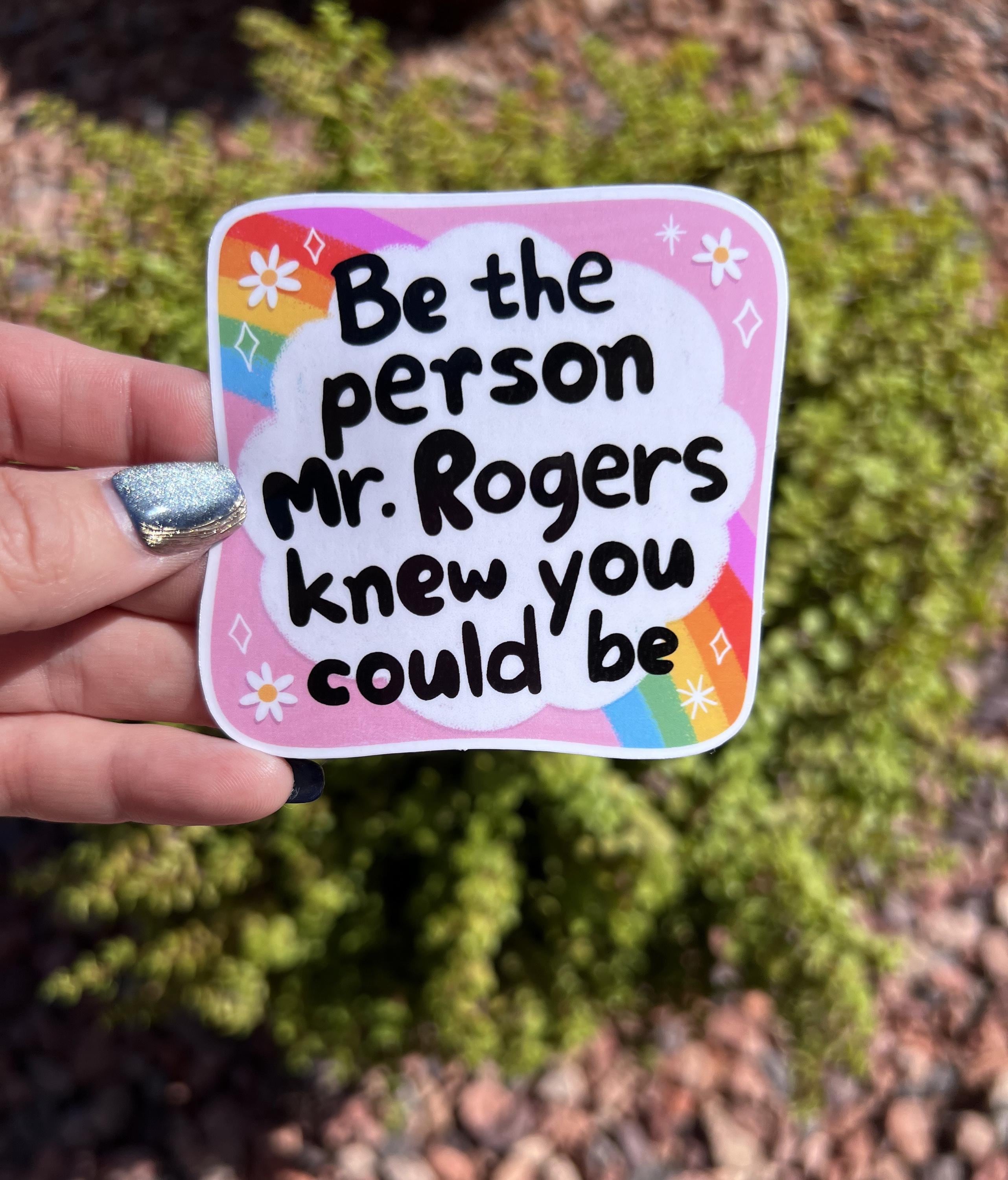 May include: A pink sticker with the words &