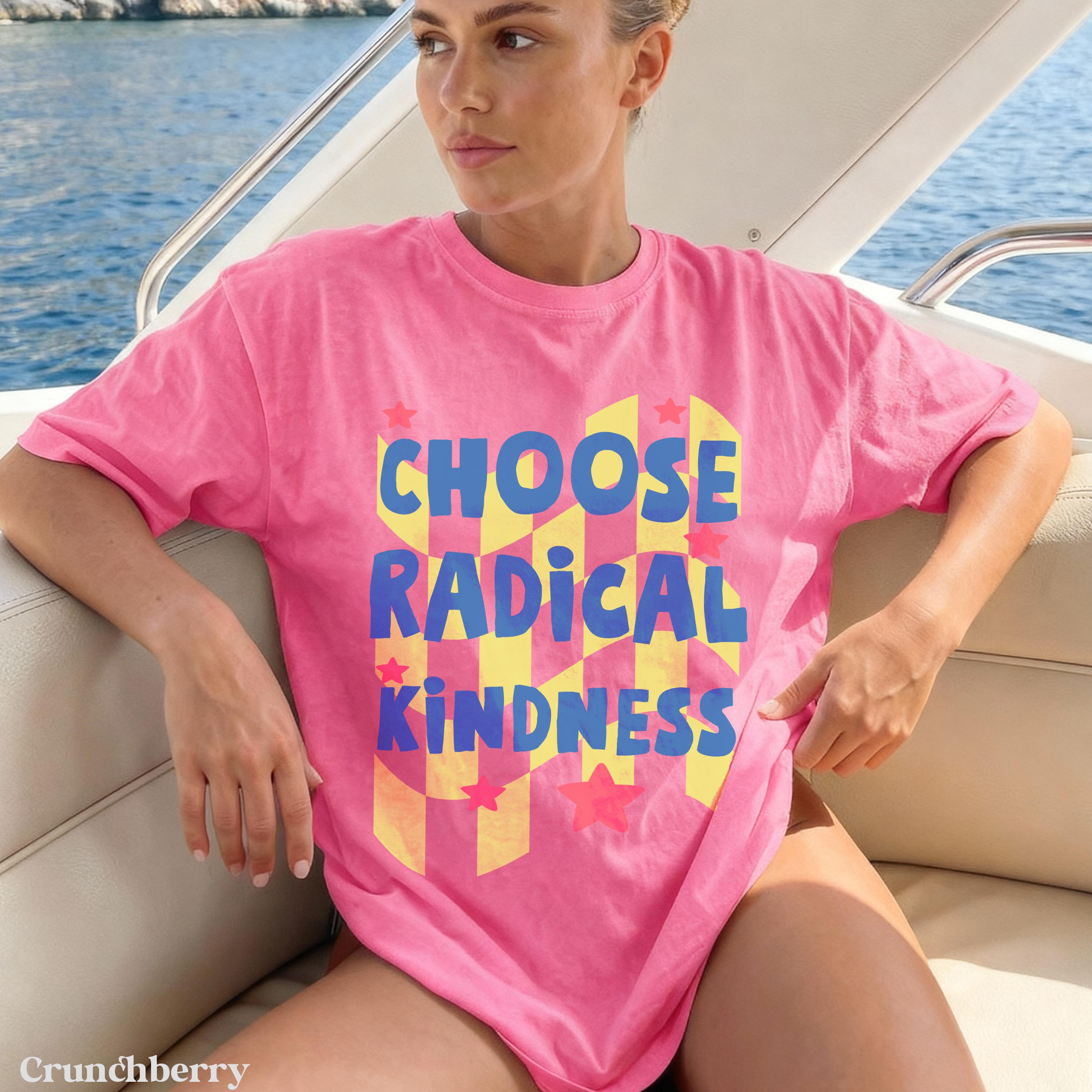 Pink t-shirt with "CHOOSE RADICAL KINDNESS" text in yellow and blue.