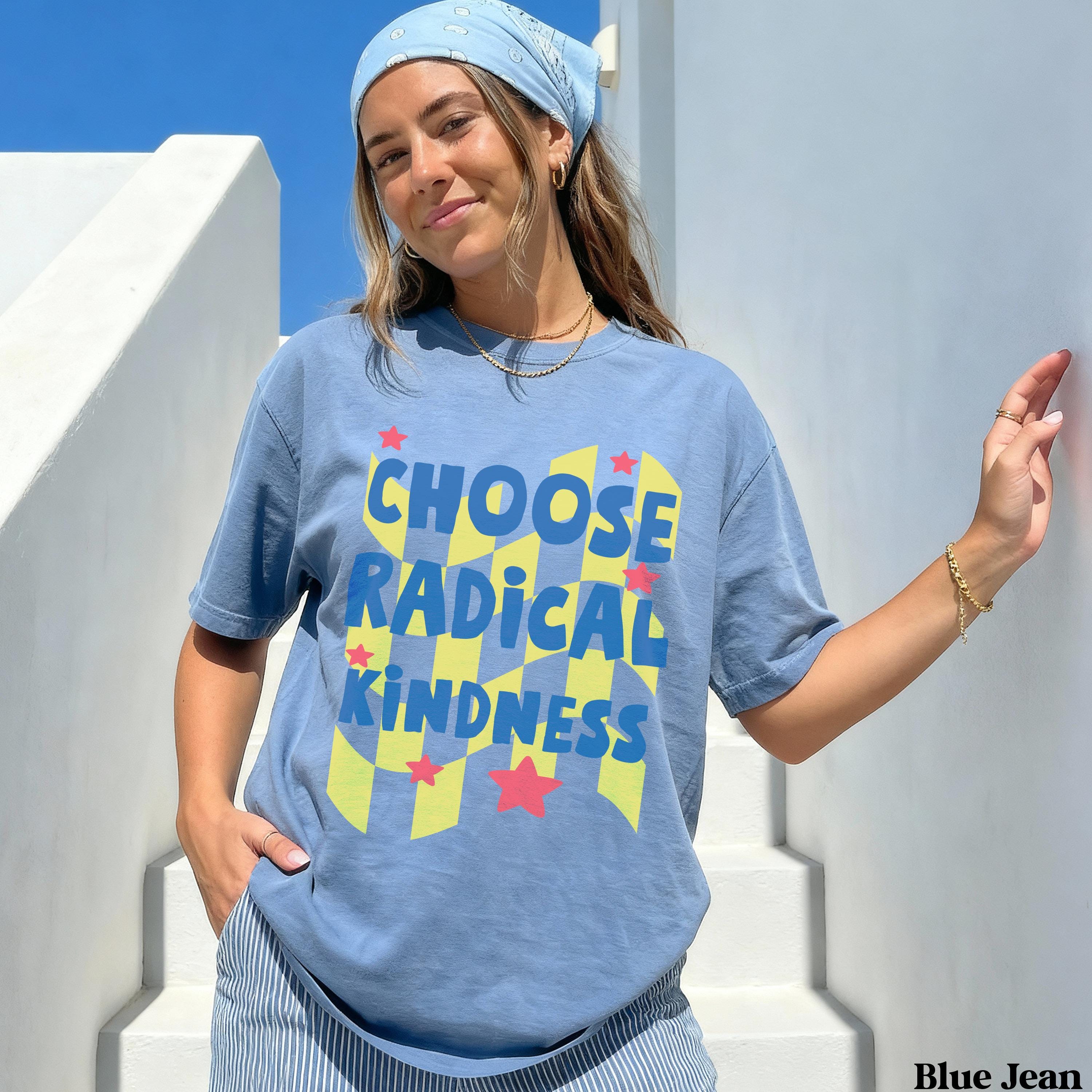 Blue t-shirt with "CHOOSE RADICAL KINDNESS" text and stars.