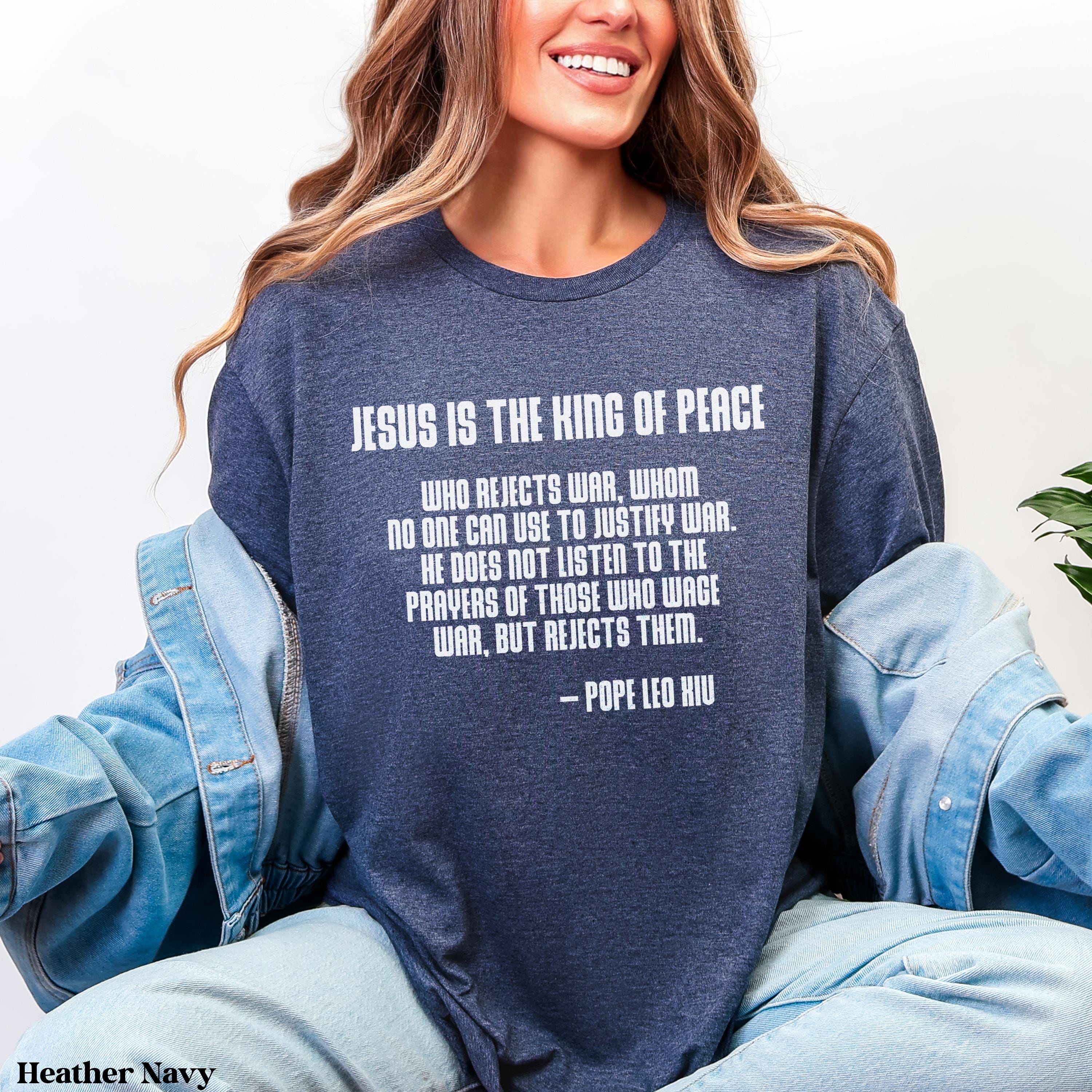 Navy t-shirt with quote "Jesus is the King of Peace" and Pope Leo XIII.