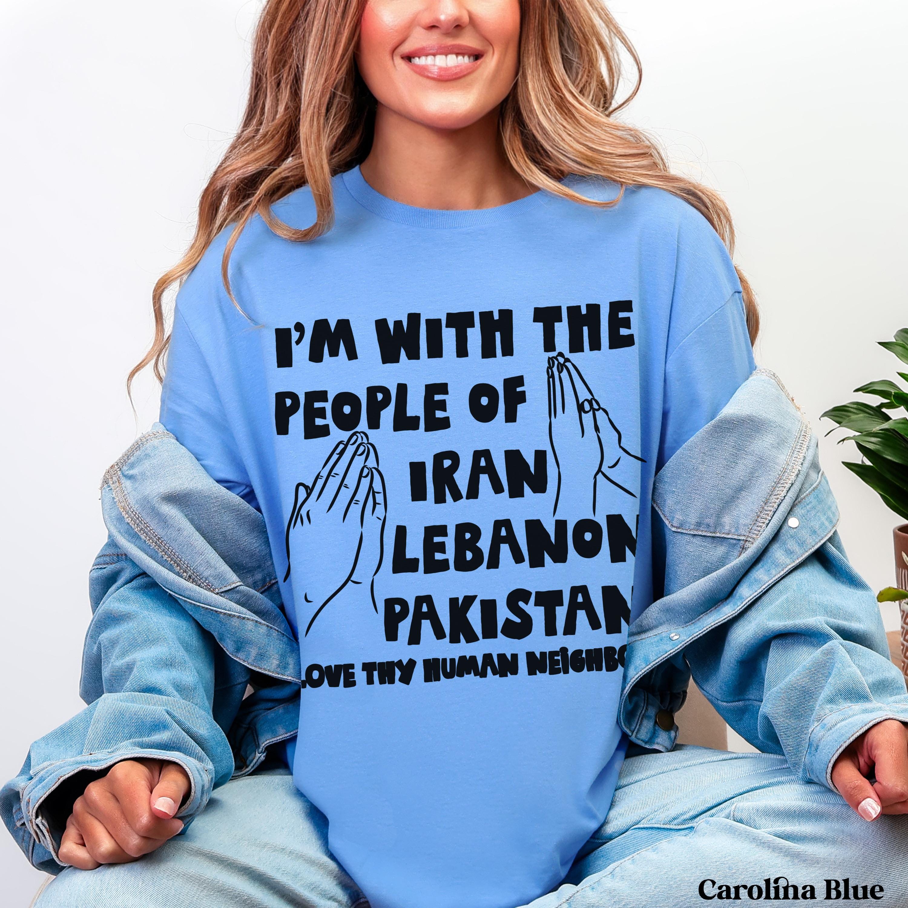 Light blue sweatshirt with text "I&