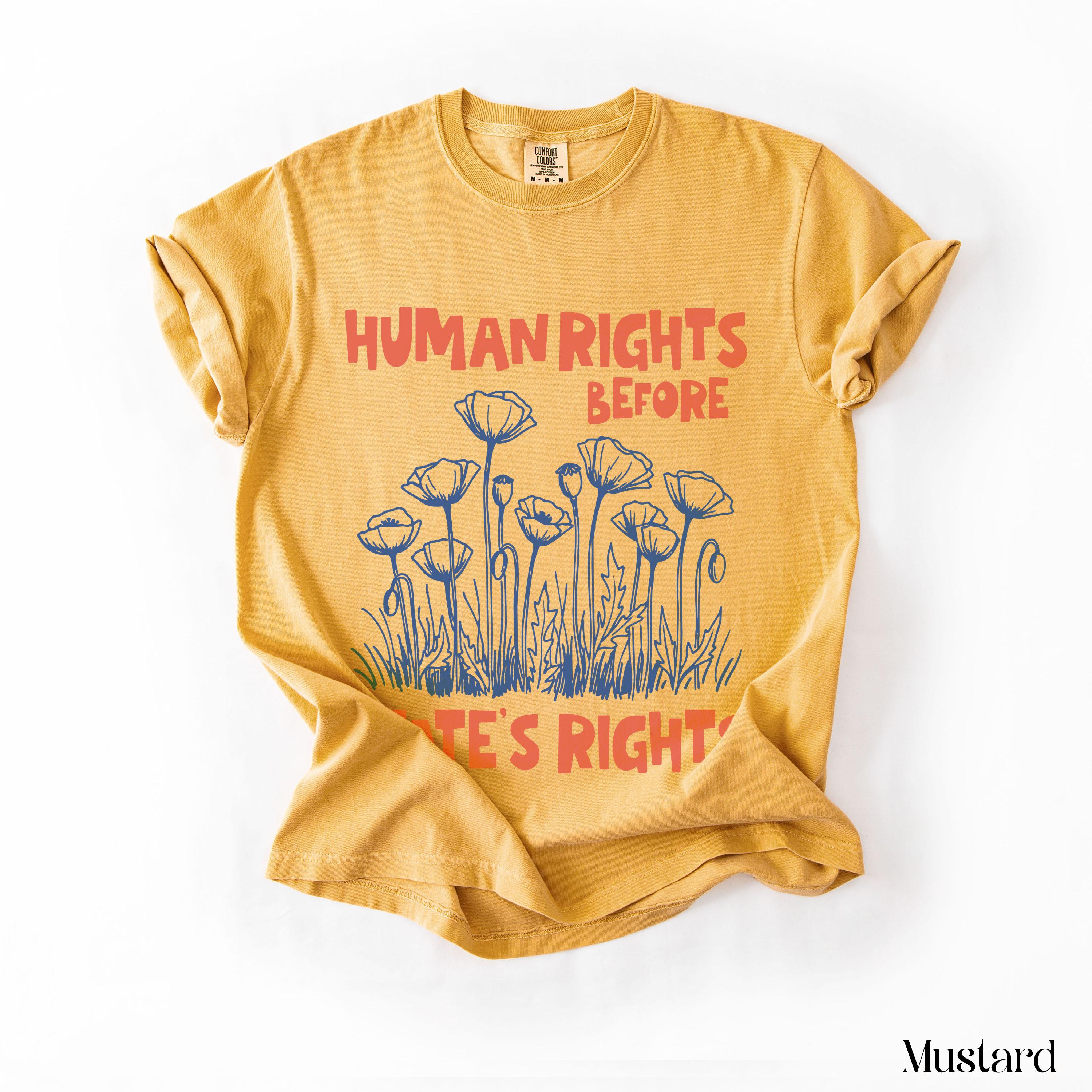 Mustard yellow t-shirt with "Human Rights Before State&