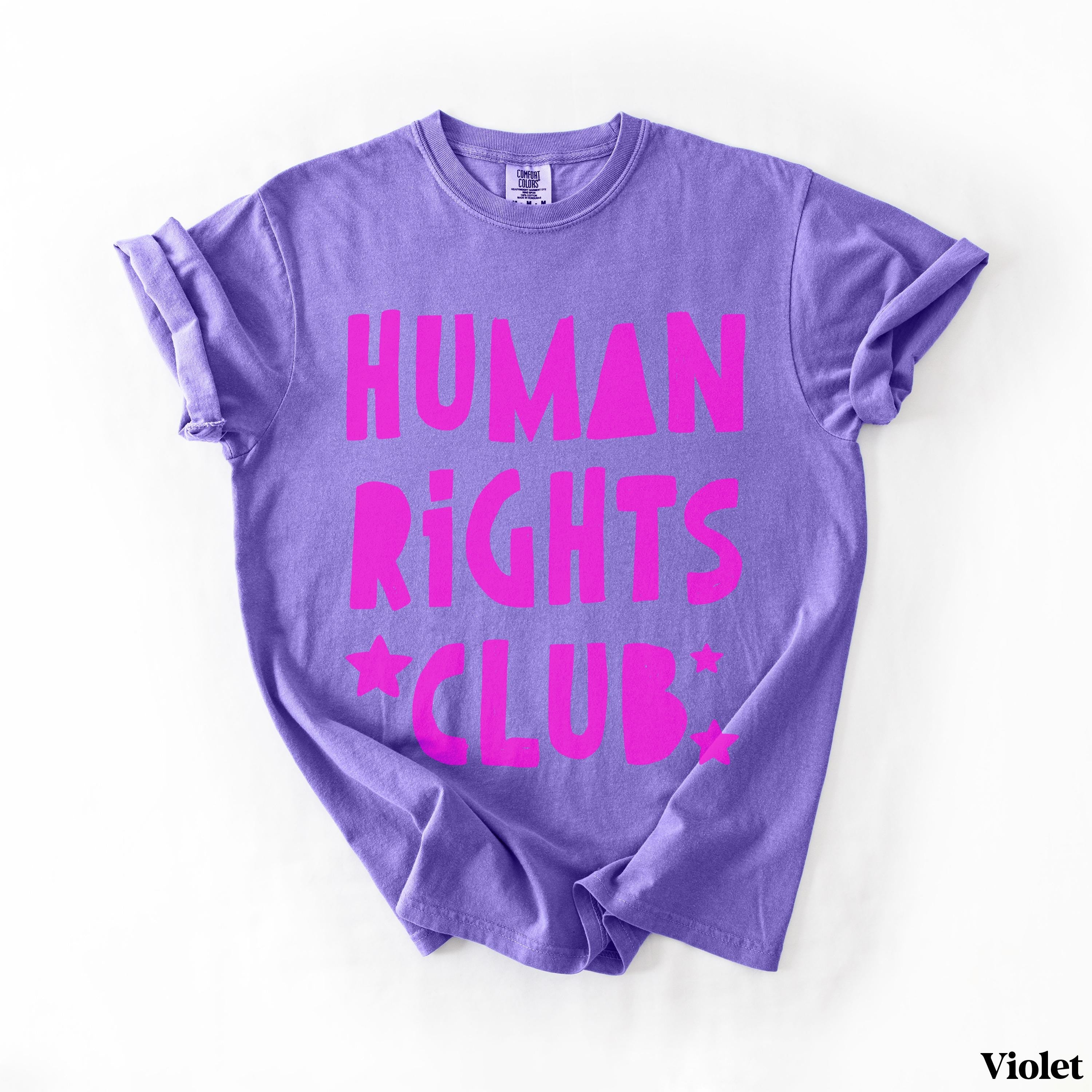 Purple t-shirt with "HUMAN RIGHTS CLUB" in bold pink lettering and stars.