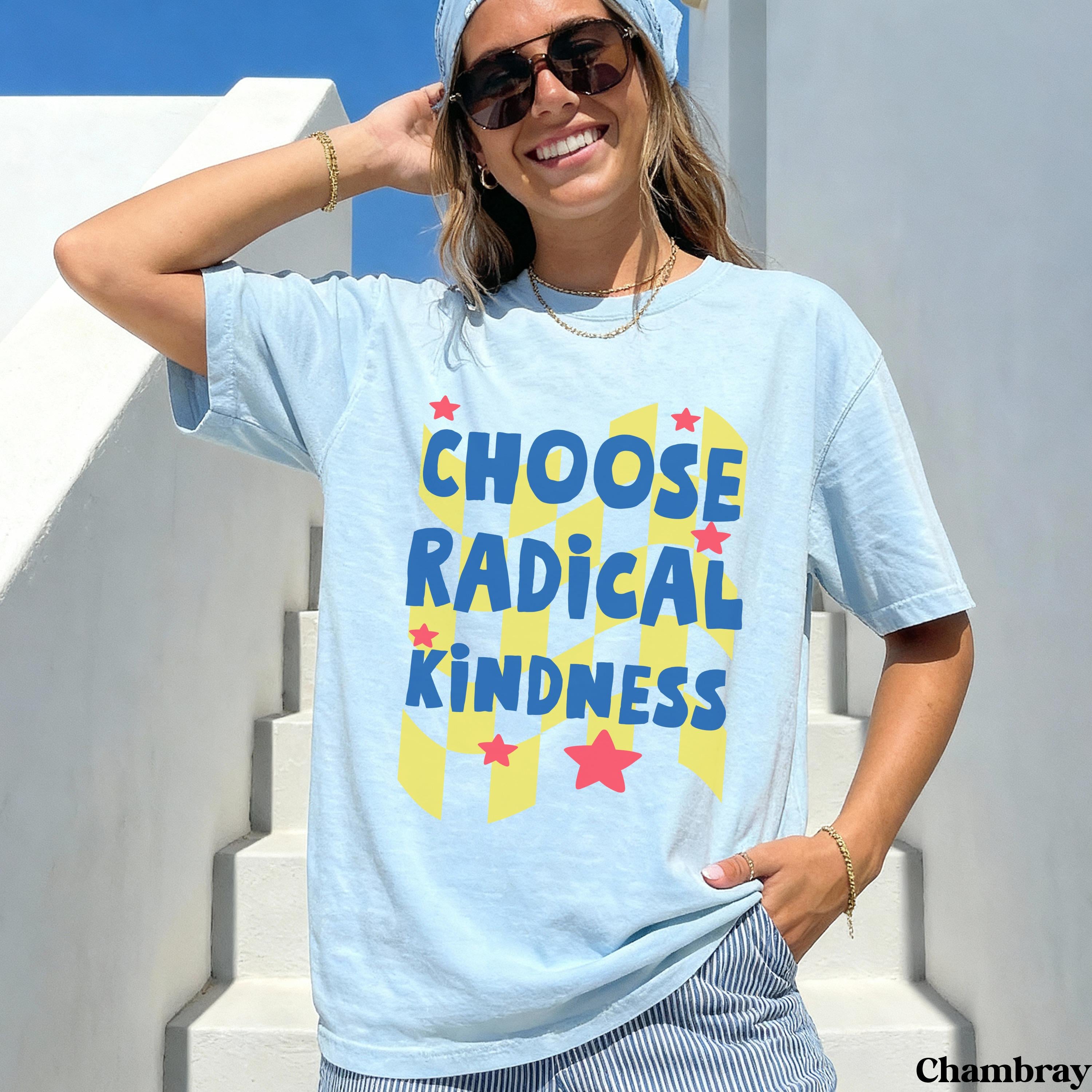 Light blue t-shirt with "CHOOSE RADICAL KINDNESS" text and red stars.