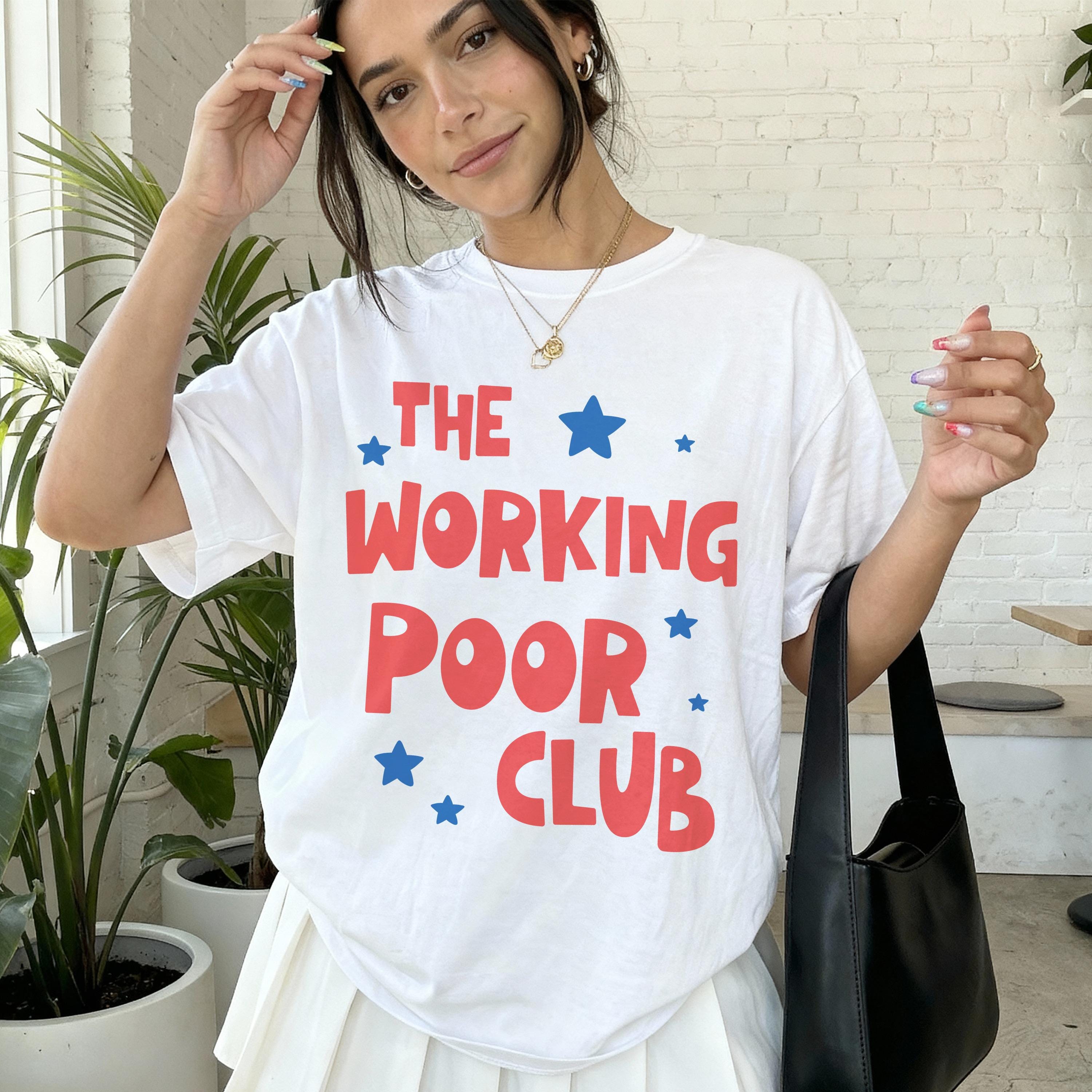 White t-shirt with "THE WORKING POOR CLUB" in red and blue text.