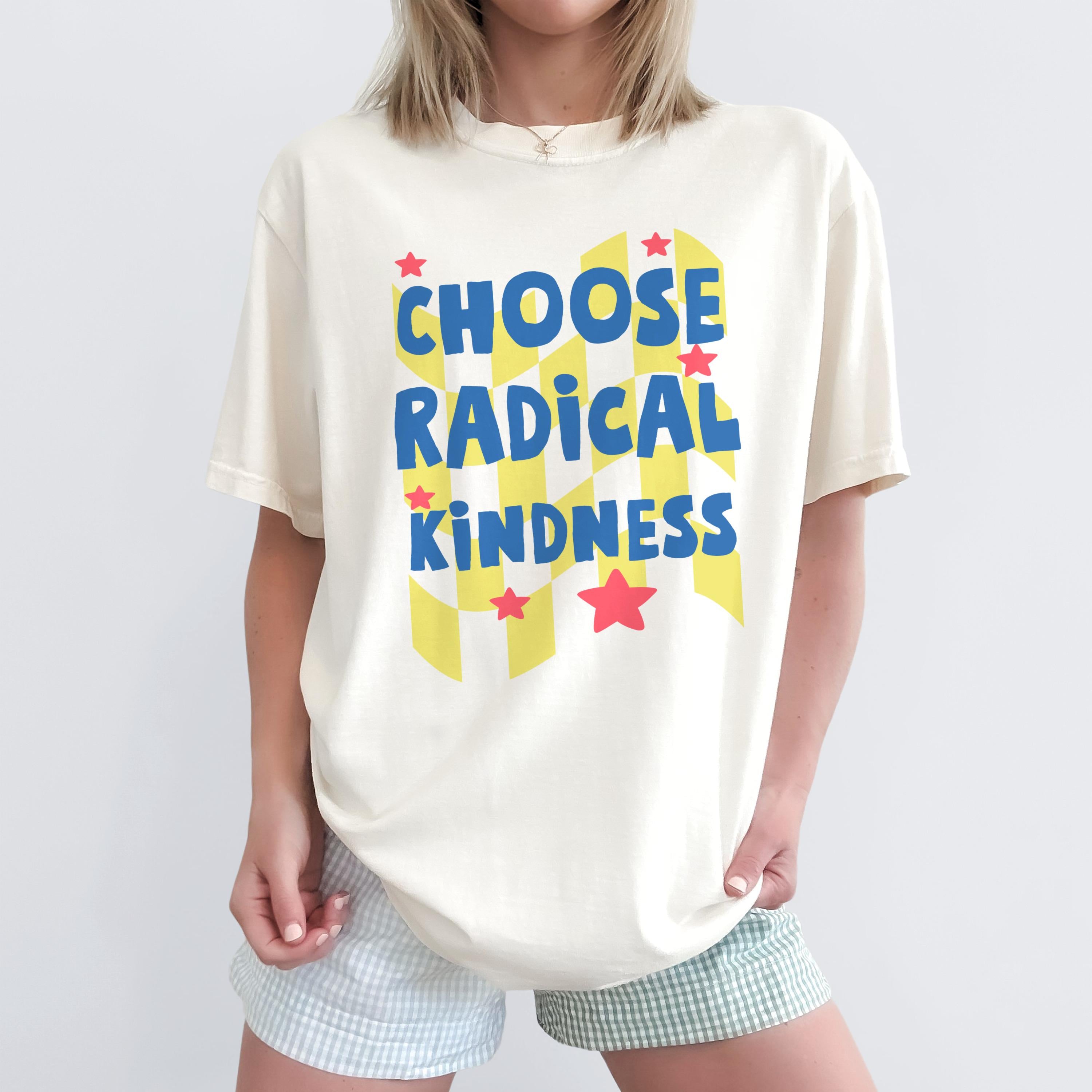 Cream t-shirt with "Choose Radical Kindness" text in blue and yellow checkered pattern.