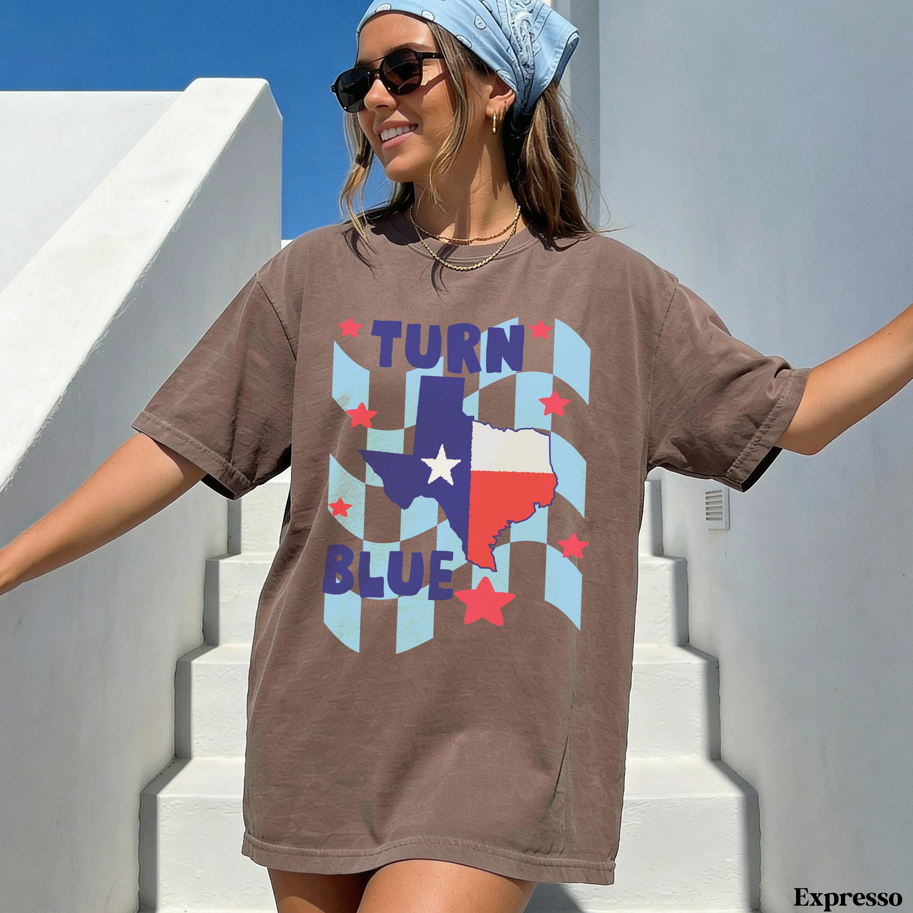 Brown t-shirt with Texas flag and "Turn Blue" text.