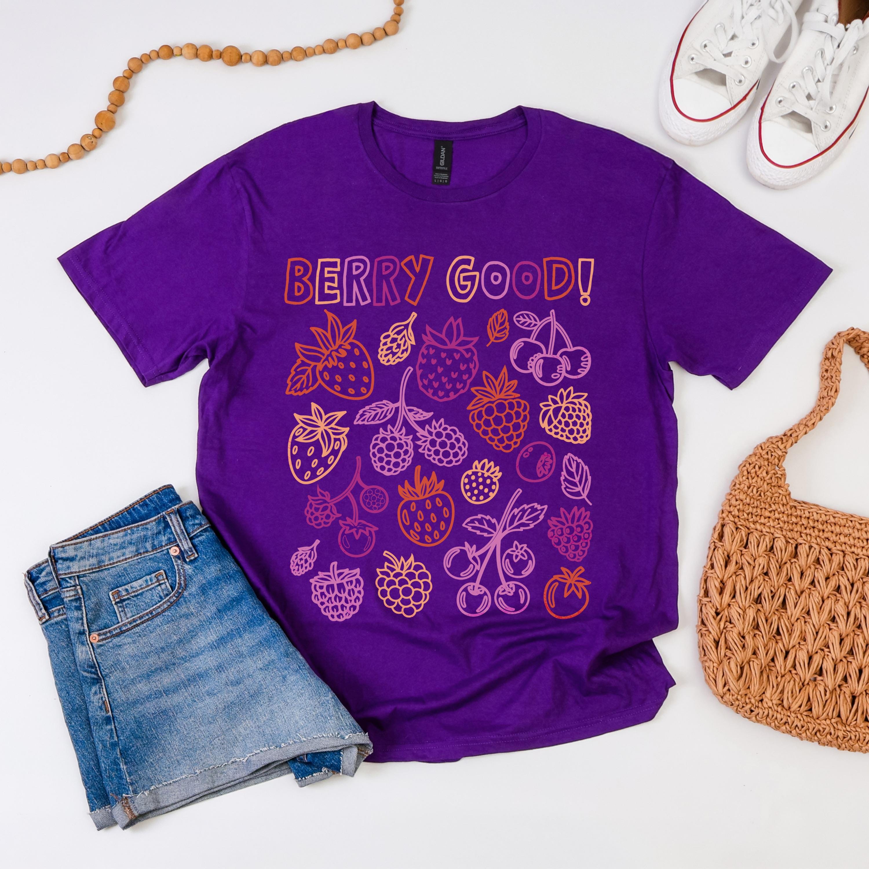 Purple t-shirt with "Berry Good!" text and berry illustrations.