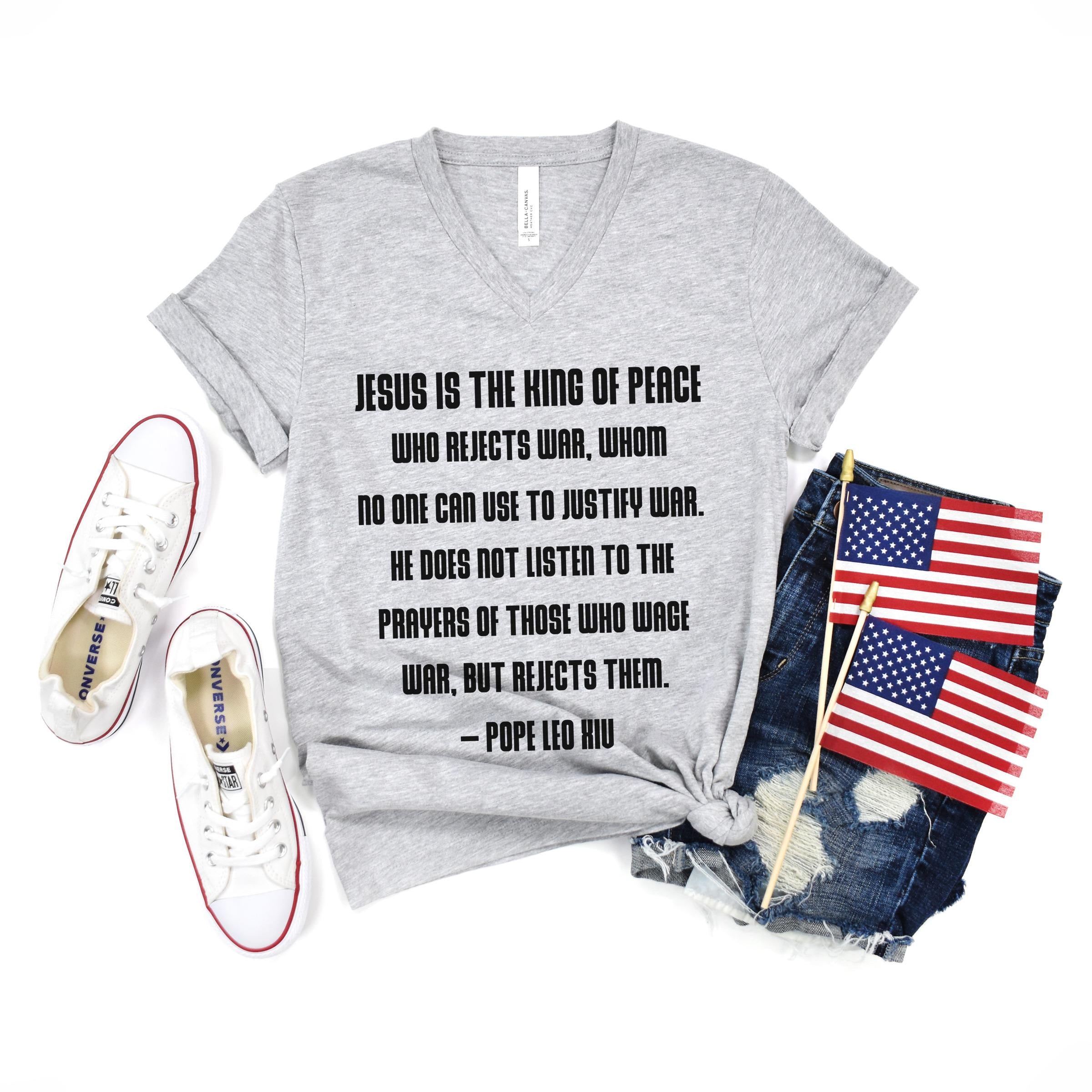 Grey t-shirt with quote from Pope Leo XIII about Jesus and war.