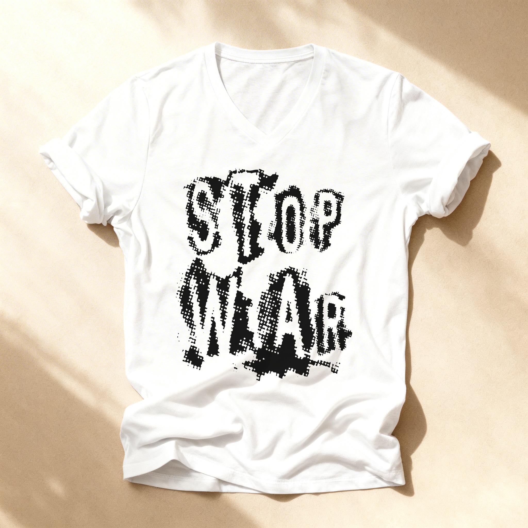 White t-shirt with black "STOP WEAR" text graphic.
