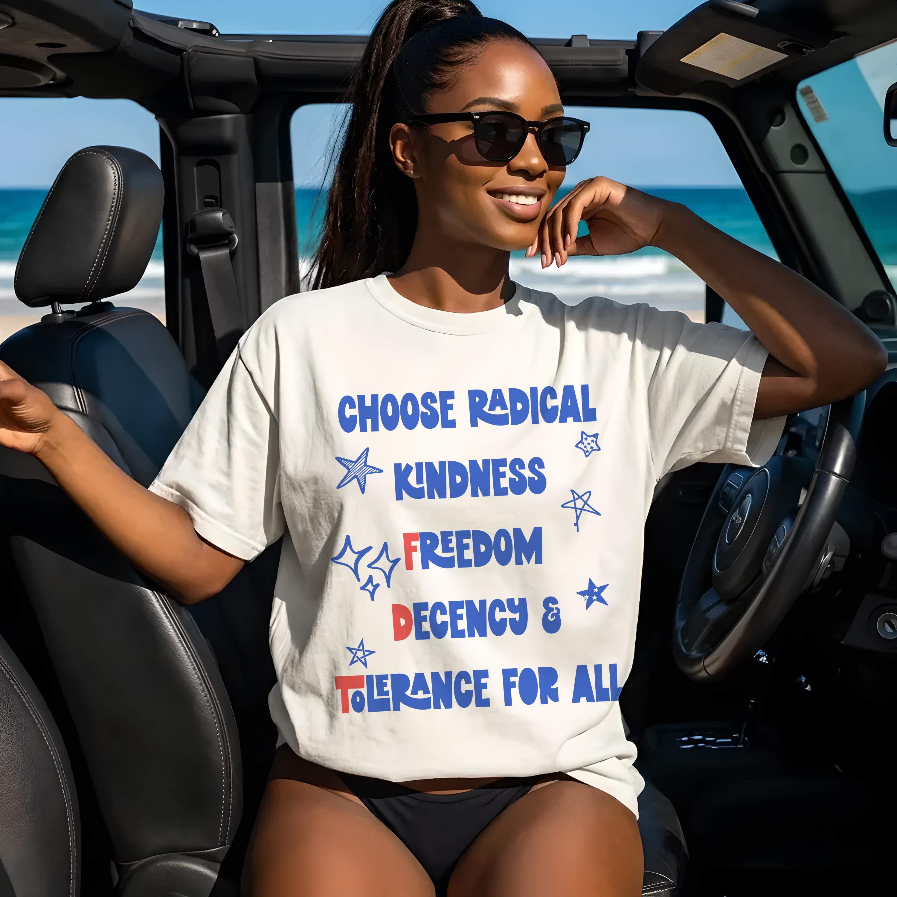 Woman in white t-shirt with "Choose Radical Freedom Kindness Decency For All" text.