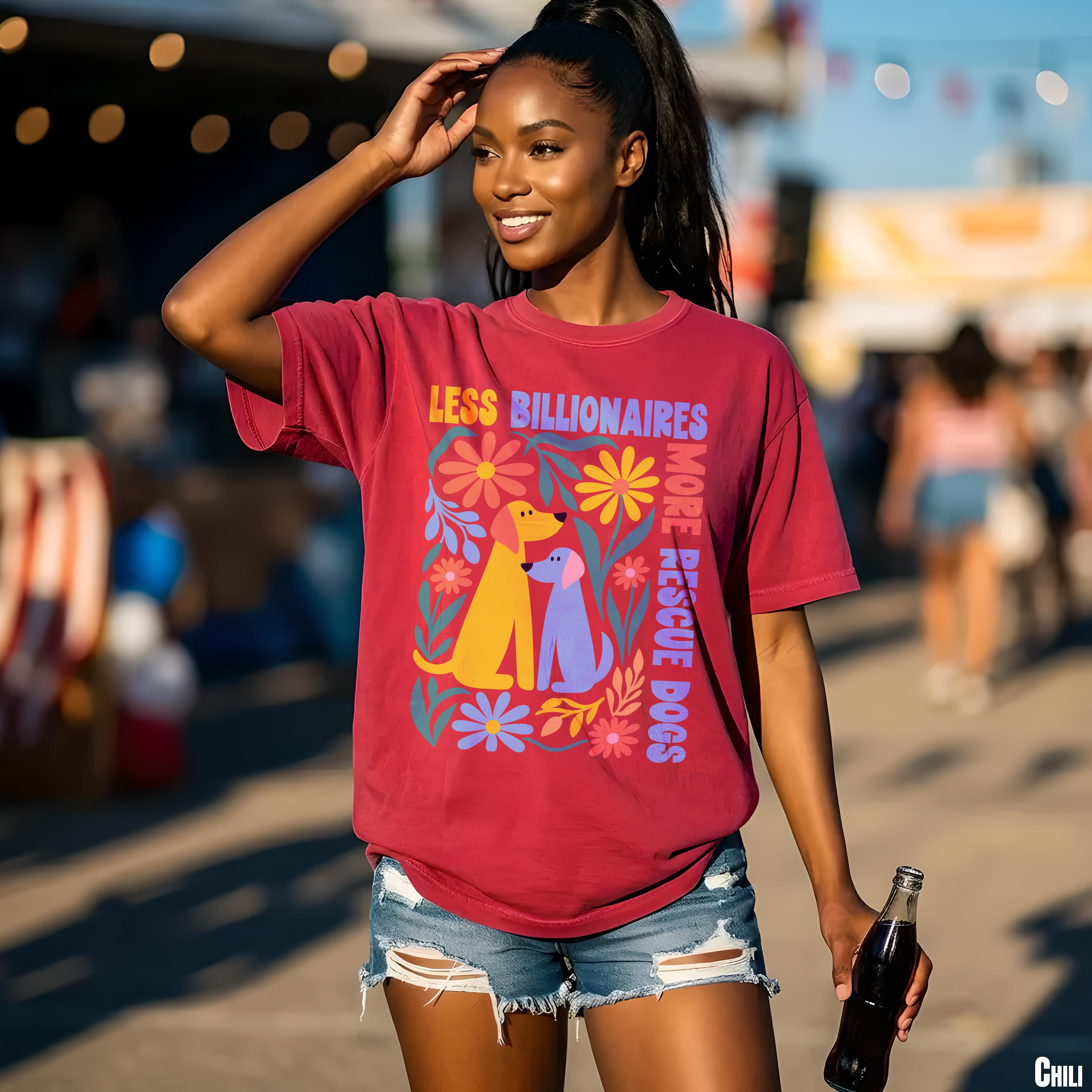 Woman wearing maroon t-shirt with "Less Billionaires, More Rescue Dogs" text and floral design.