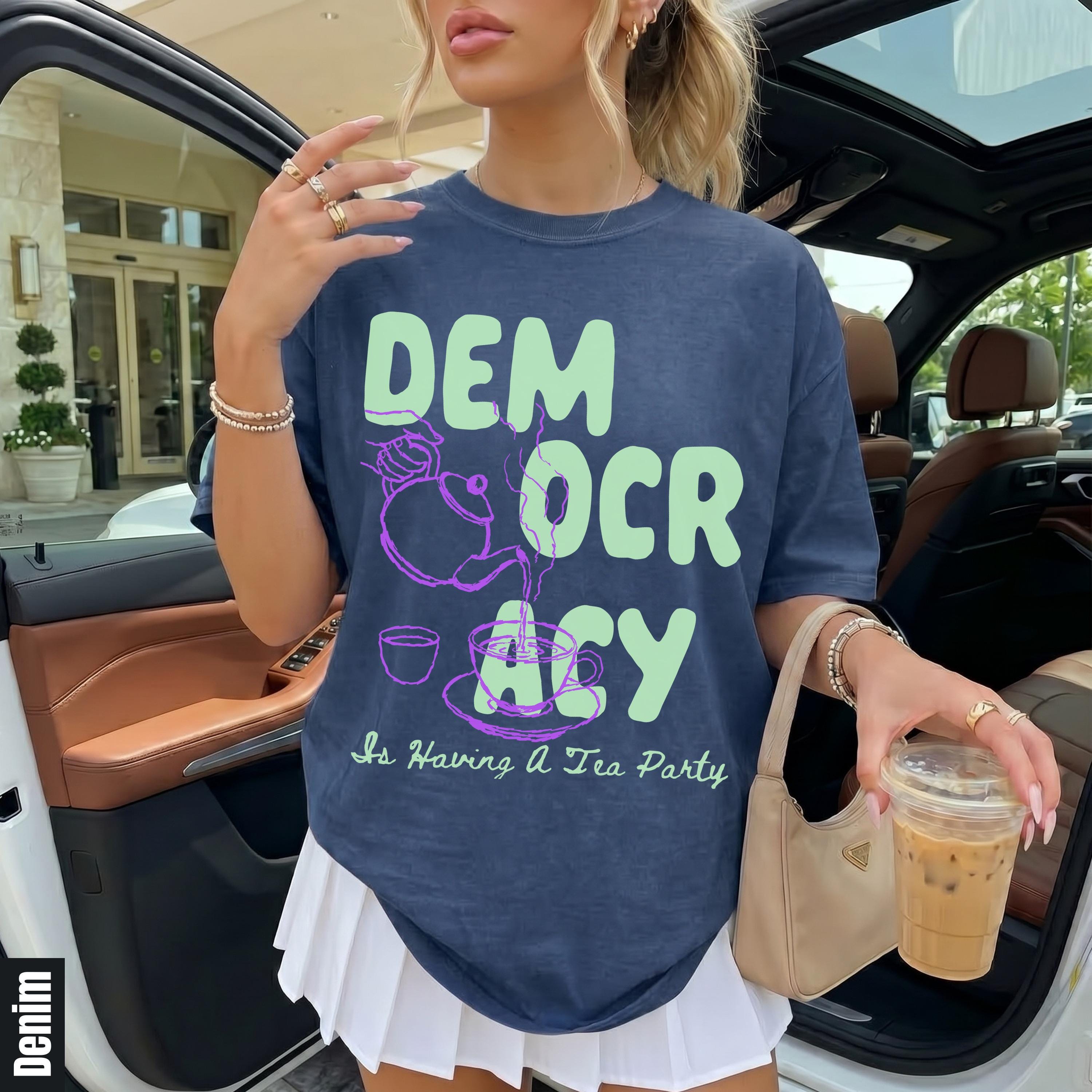 Navy t-shirt with "DEMOCRACY Is Having A Tea Party" text and graphic.