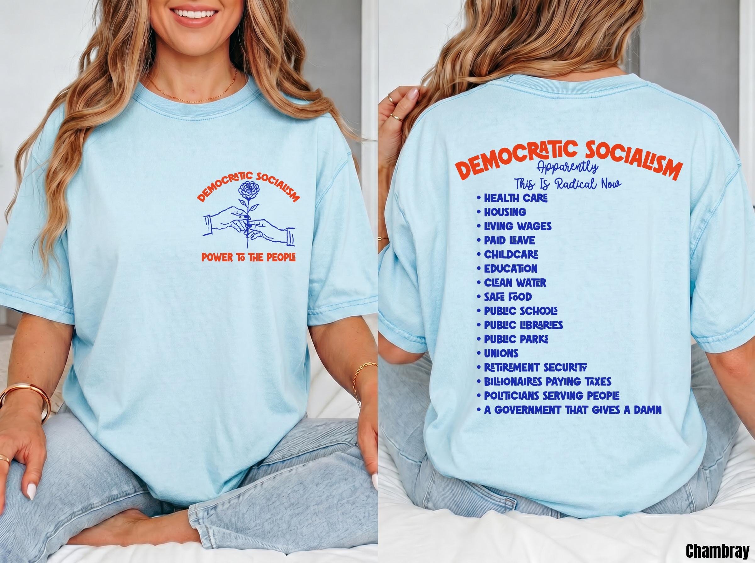 Light blue shirt with blue and red "Democratic Socialism" text and graphic.