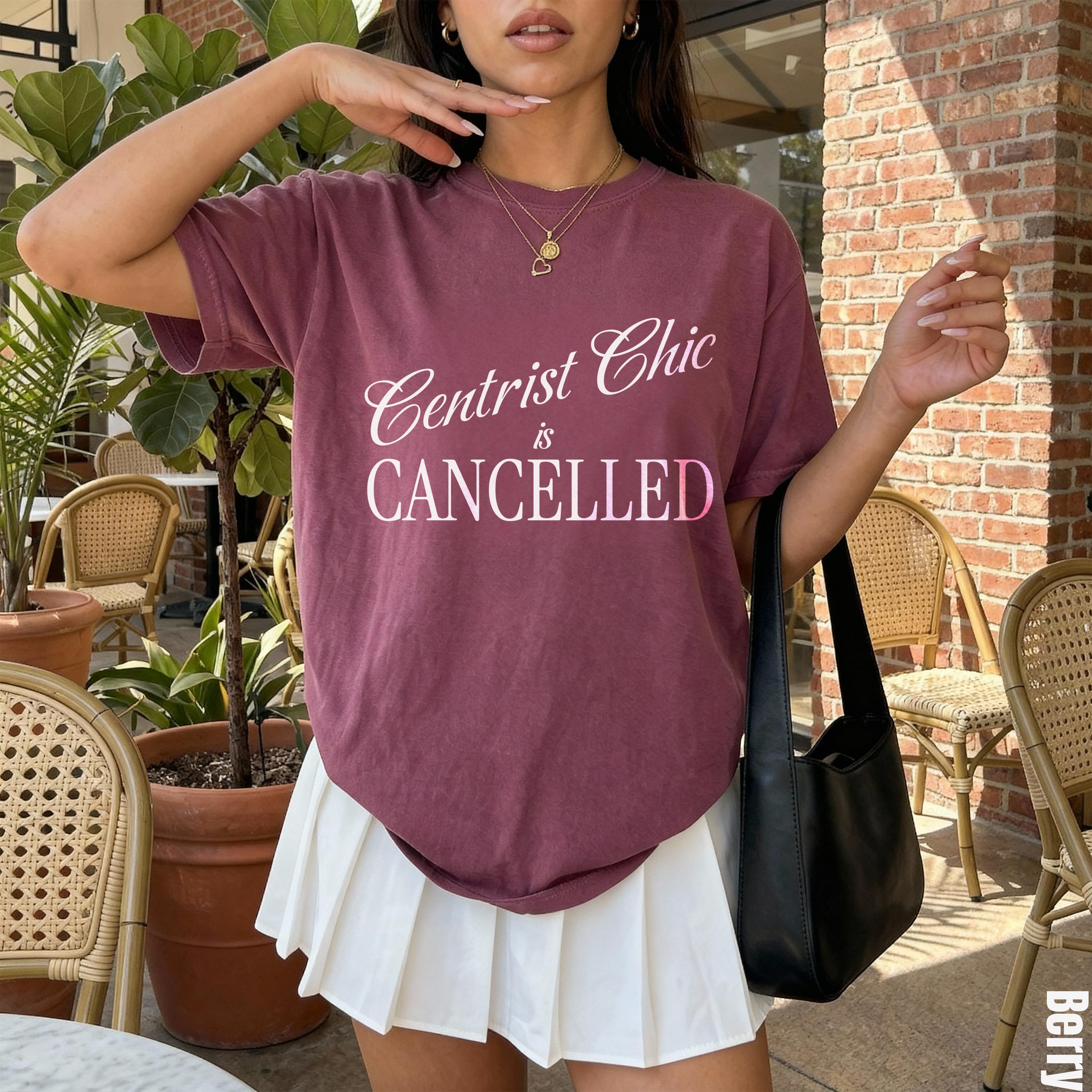 Maroon t-shirt with "Centrist Chic is CANCELLED" text, paired with a white pleated skirt.