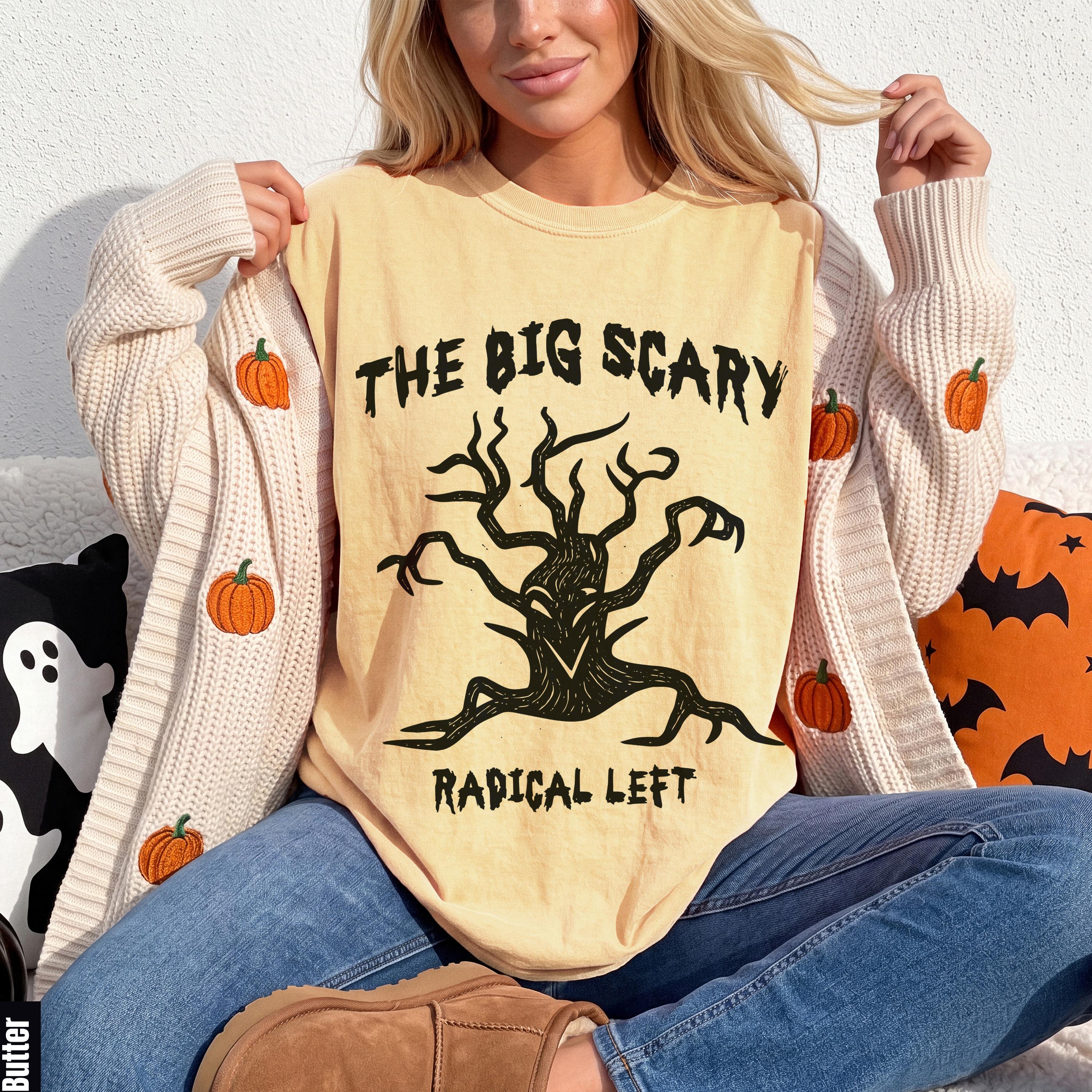 Light yellow t-shirt with black graphic of a scary tree and text "THE BIG SCARY RADICAL LEFT".