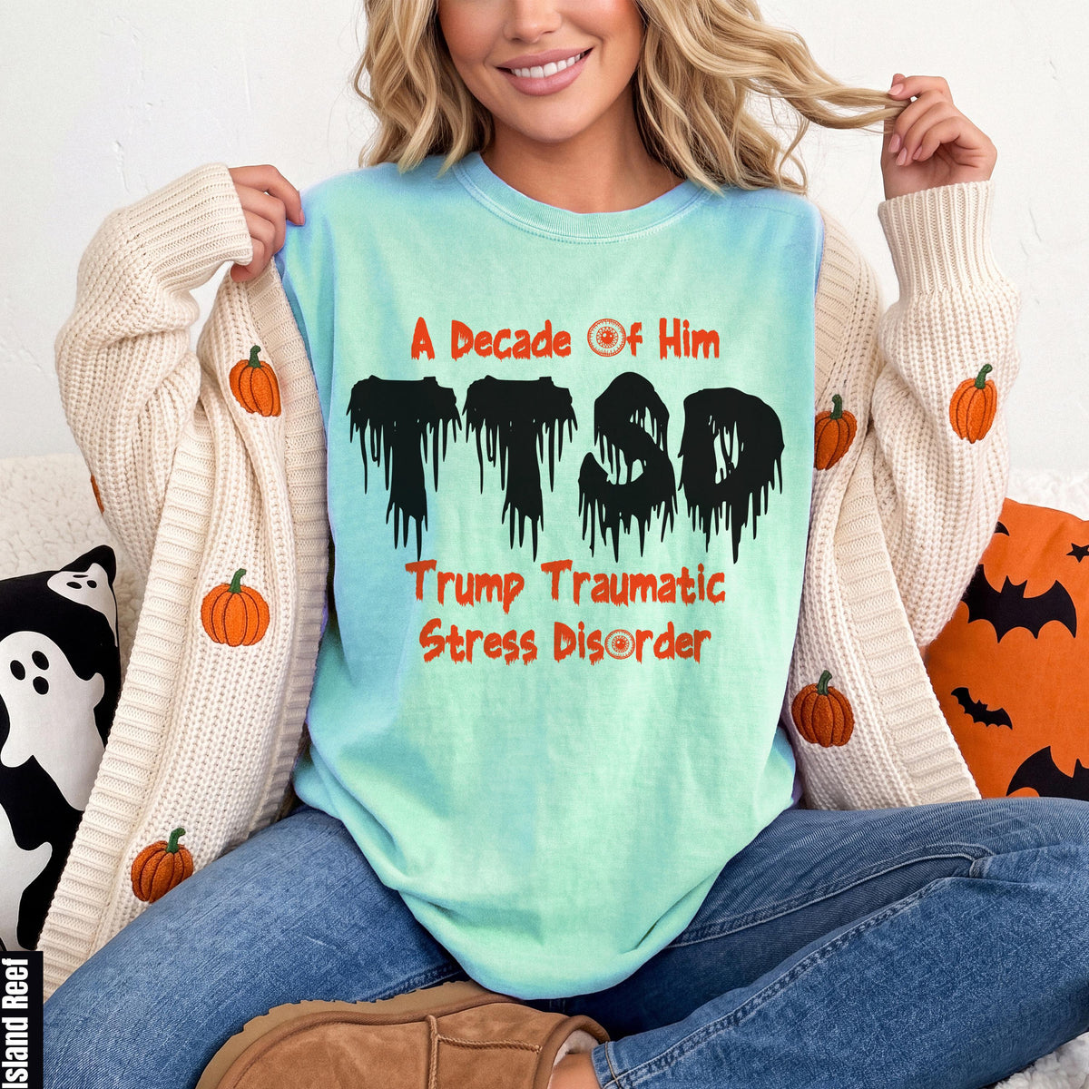 Graphic t-shirt with "A Decade Of Him" and "Trump Traumatic Stress Disorder".