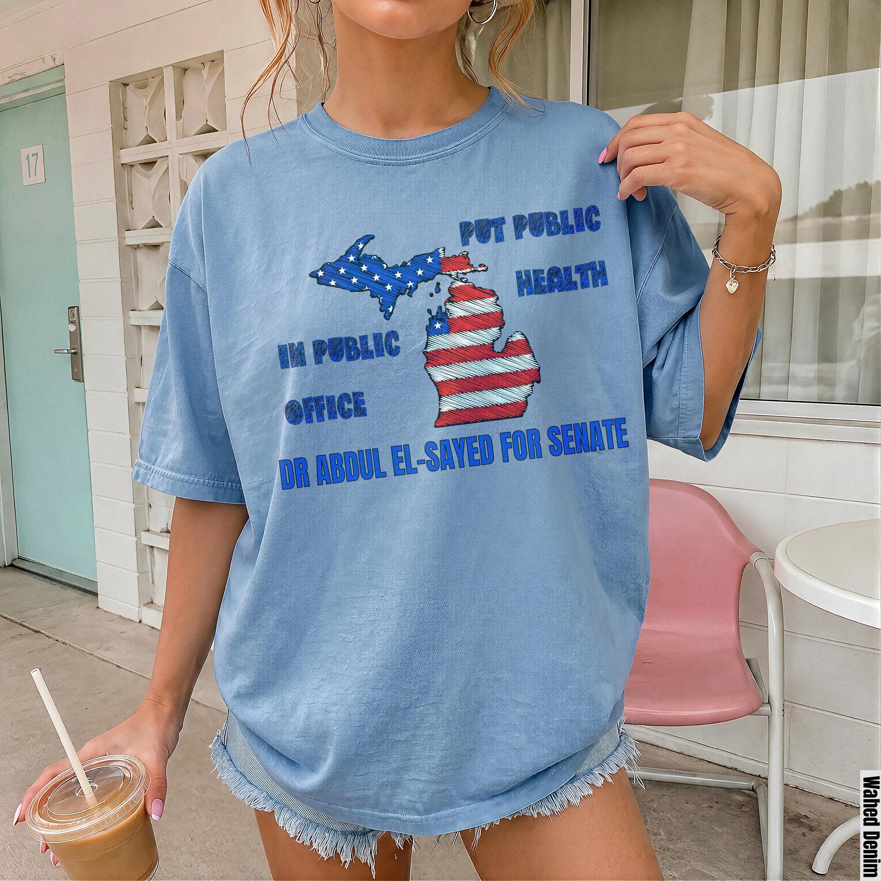 Blue t-shirt with Michigan map and "Put public health in public office Dr Abdul El-Sayed for Senate" text.