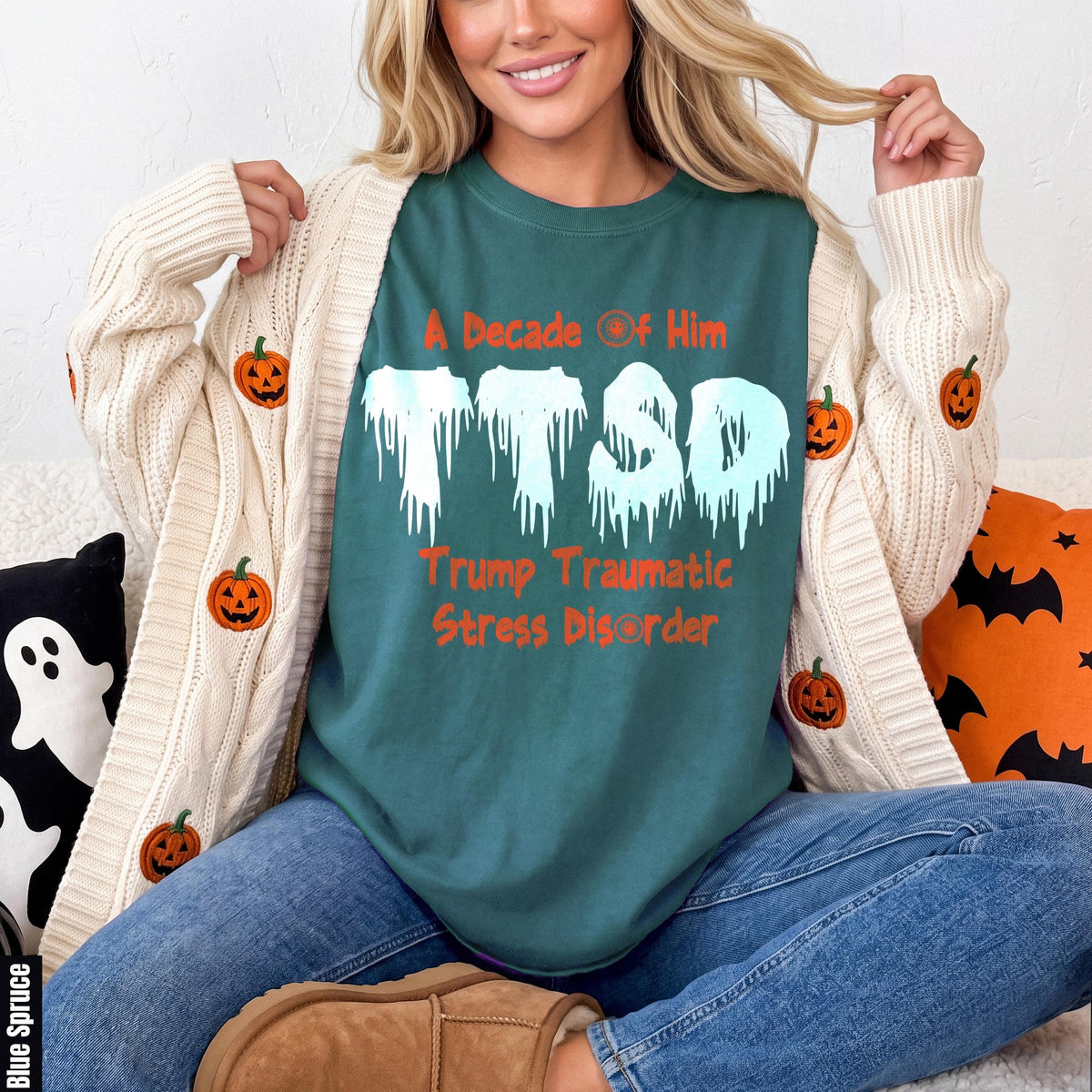 Teal t-shirt with "A Decade Of Him PTSD Trump Traumatic Stress Disorder" text.