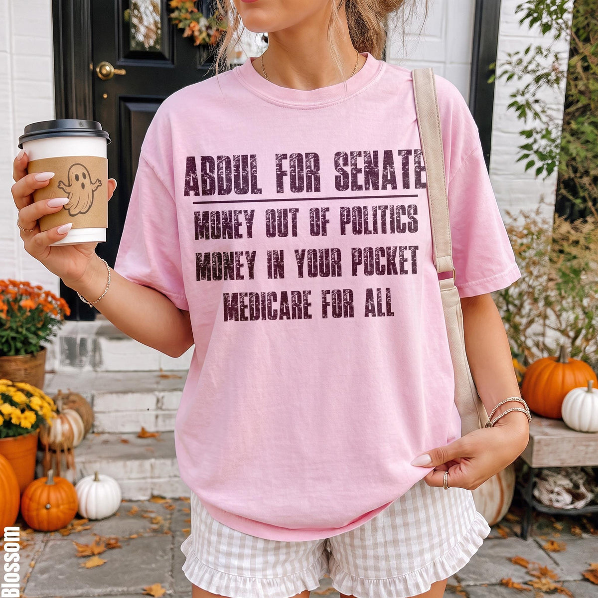 Pink t-shirt with text: Abdul for Senate, Money out of Politics, Money in your pocket, Medicare for All.