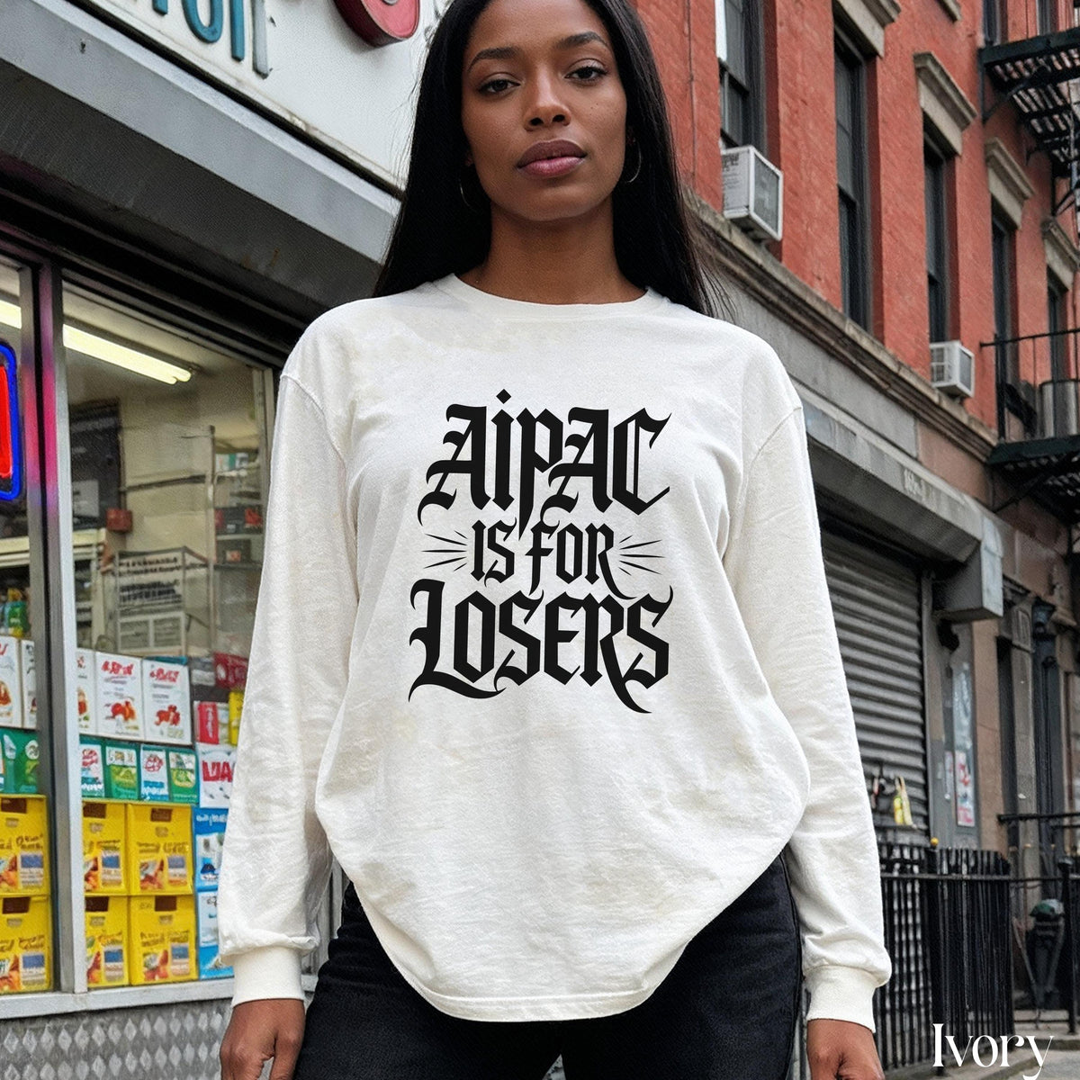 Ivory long sleeve shirt with "Aipac is for Losers" text graphic.