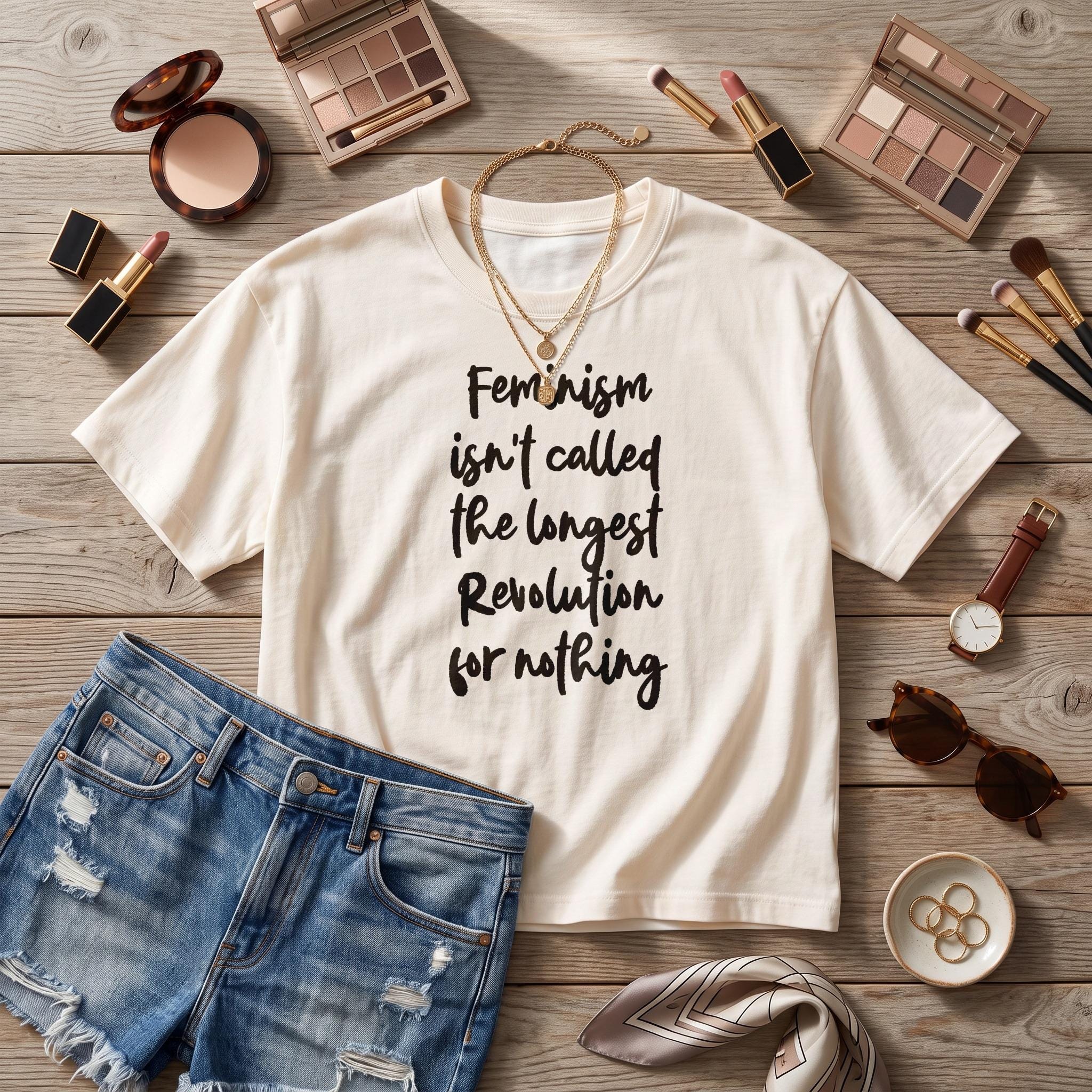 Cream t-shirt with "Feminism isn&
