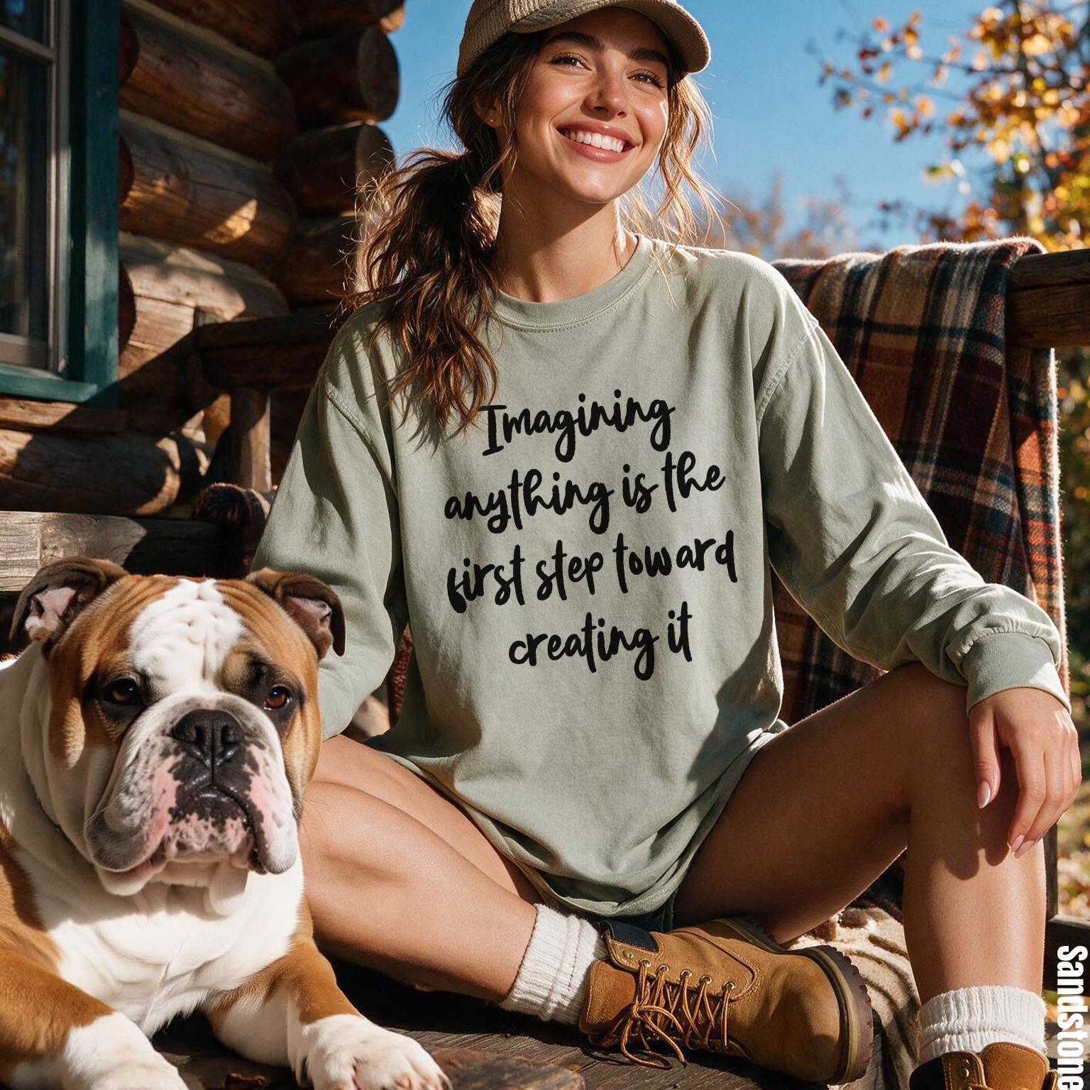 Woman in light green shirt with quote and bulldog sitting by log cabin.