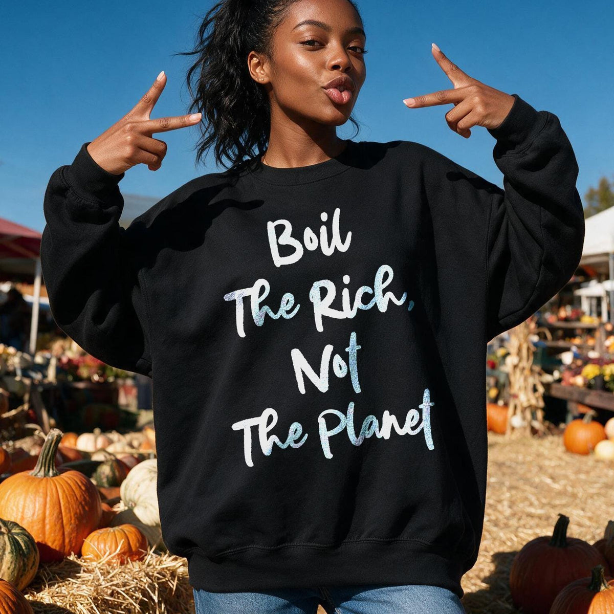 Black sweatshirt with "Boil the Rich, Not the Planet" text.