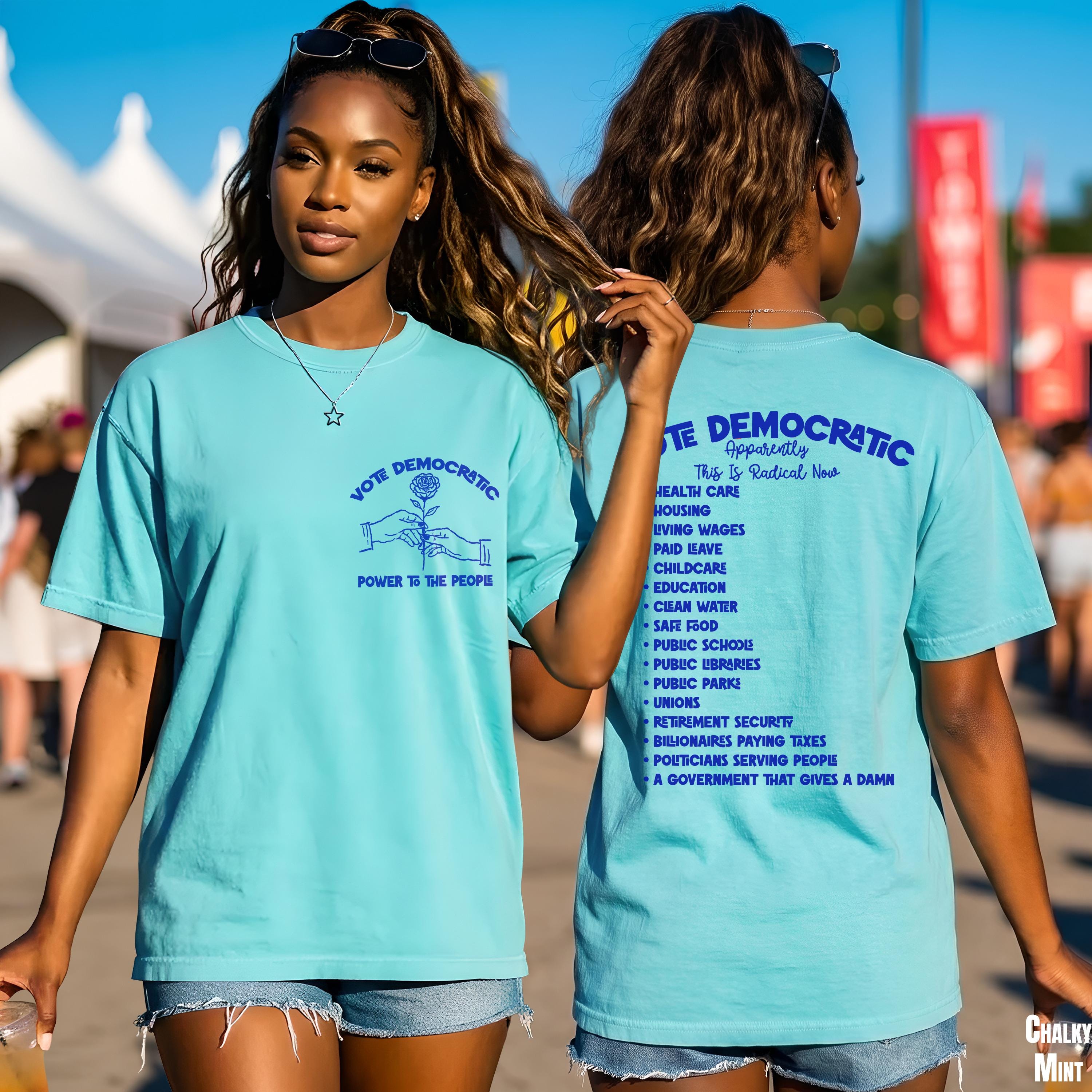 Aqua t-shirt with "Vote Democratic" graphic and a list of policies on the back.