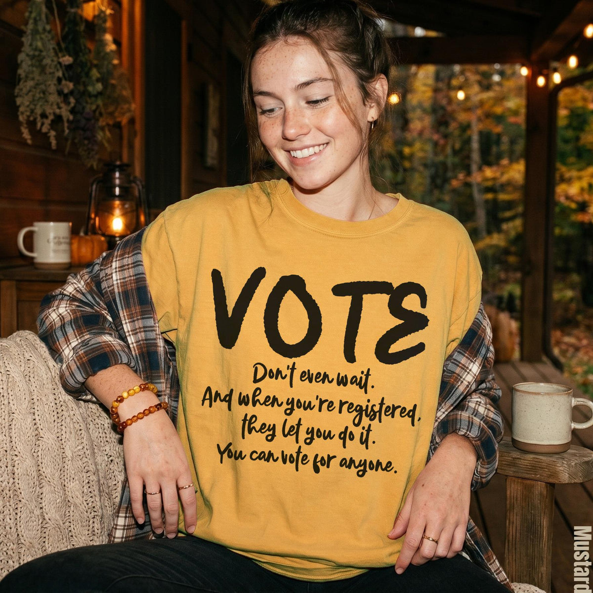 Yellow t-shirt with black text: "VOTE Don&