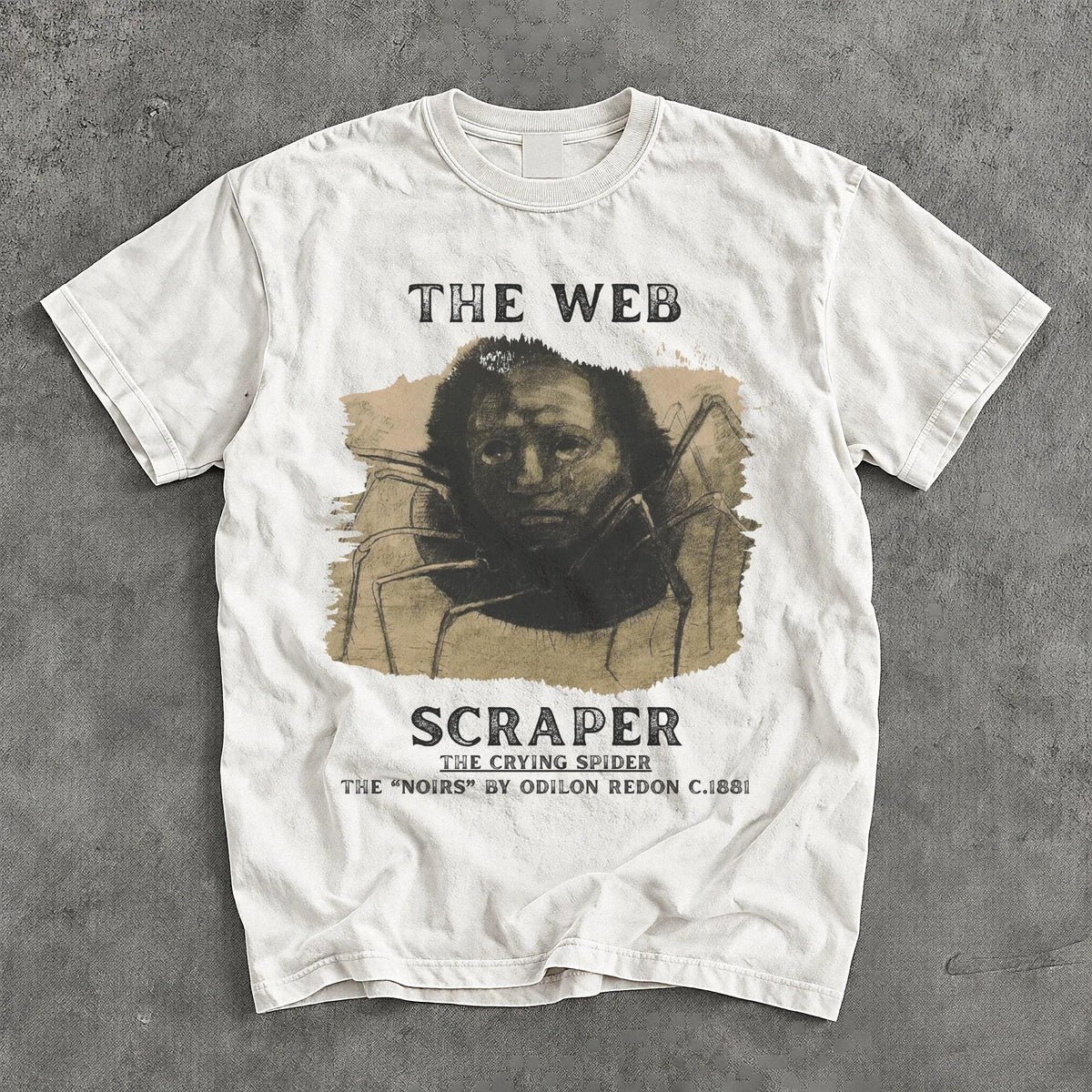 White t-shirt with art of a spider-like creature and text: THE WEB SCRAPER, THE CRYING SPIDER.