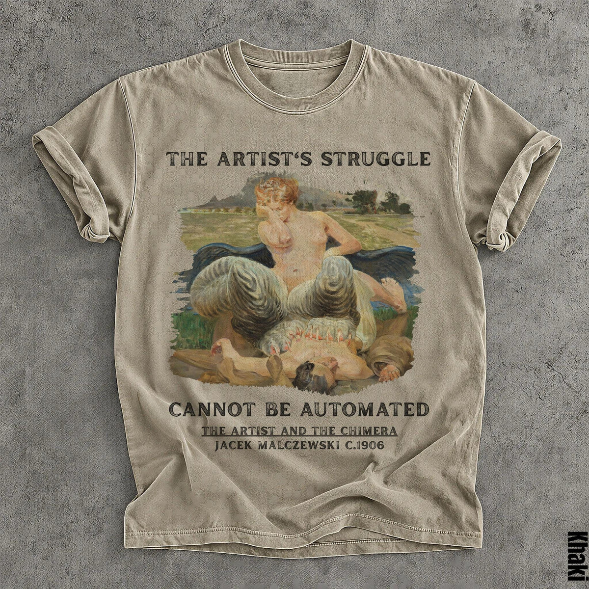 T-shirt with painting of woman and creature, text "The Artist&