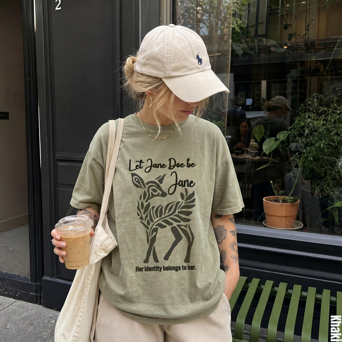 Olive green t-shirt with "Let Jane Doe be Jane" and deer graphic.