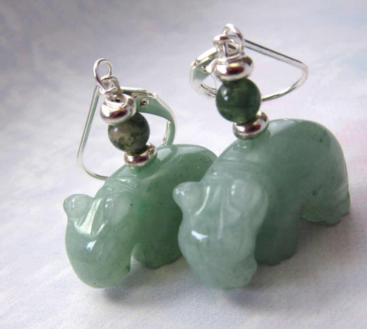 Aventurine Hippopotamus Earrings – Handcrafted Stone Animal Jewelry featuring green stone beads, aventurine hippo charms, and silver hooks, displayed on a light background—a unique accessory for animal lovers.