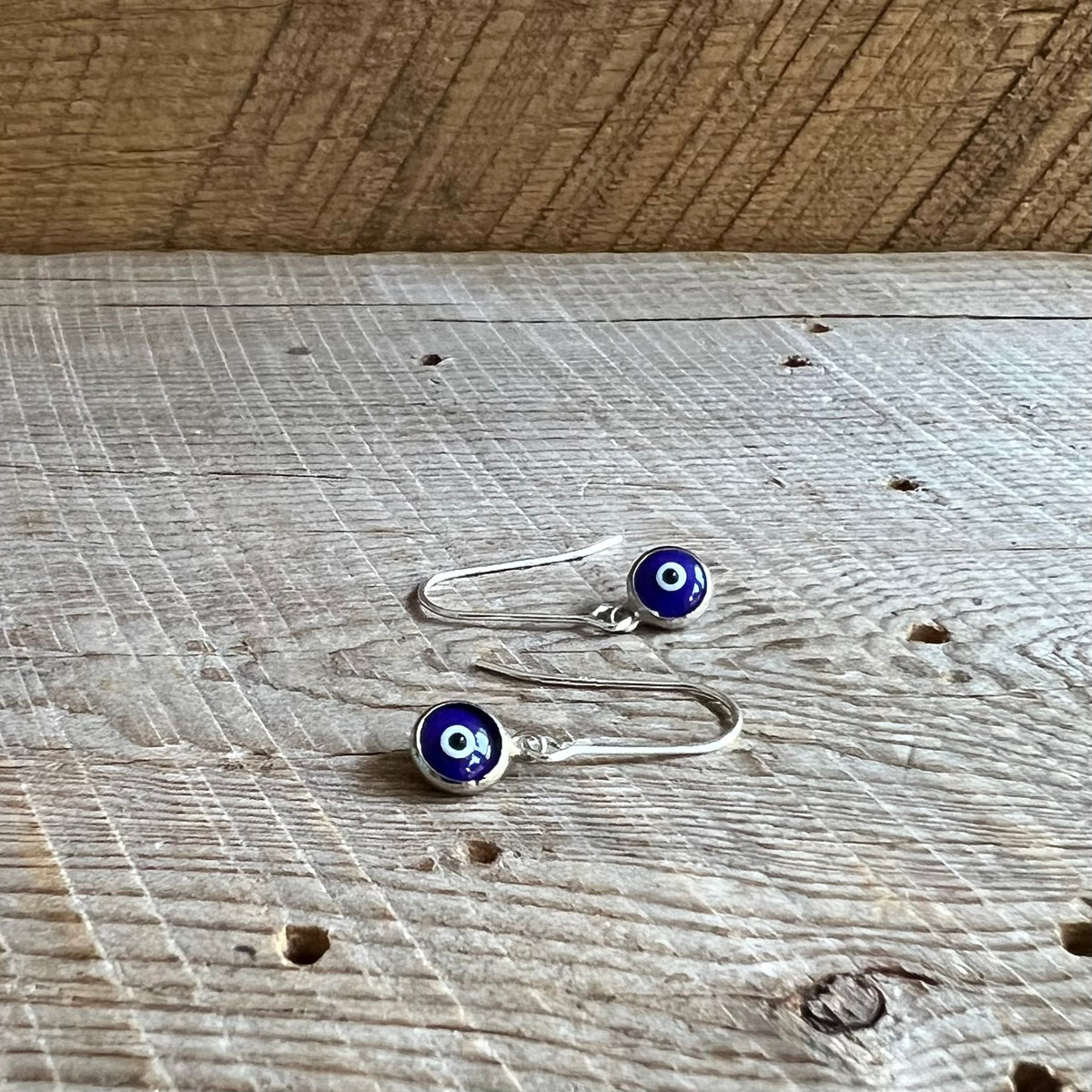 SariBlue® Mini Dark Blue Crystal Evil Eye Earrings on Petite Sterling Silver Hooks