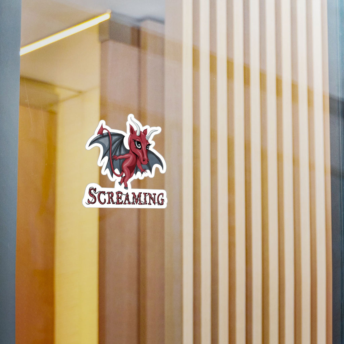 Medium Jersey Devil cryptid sticker on a glass window in a modern interior