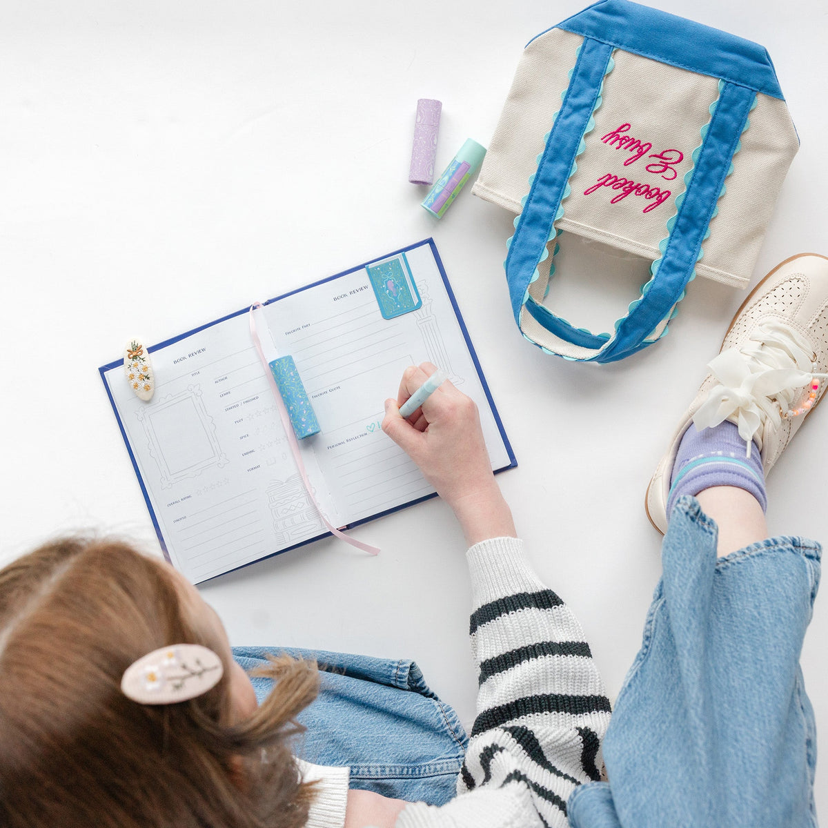 Book Club Reading Journal interior pages showing reading log, rating fields, and review prompts, Jollity & Co.