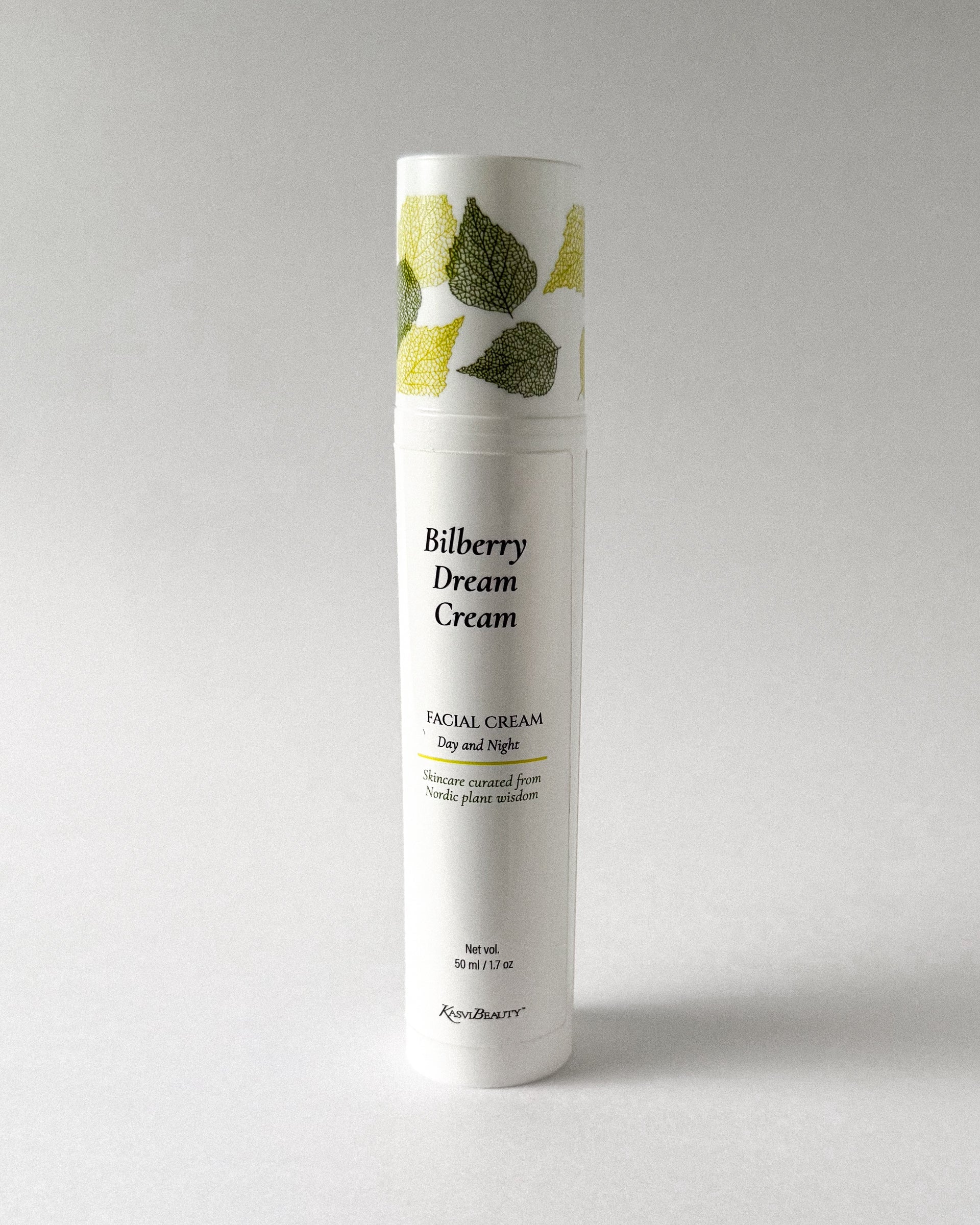 Bilberry Dream Cream bottle on a light gray background